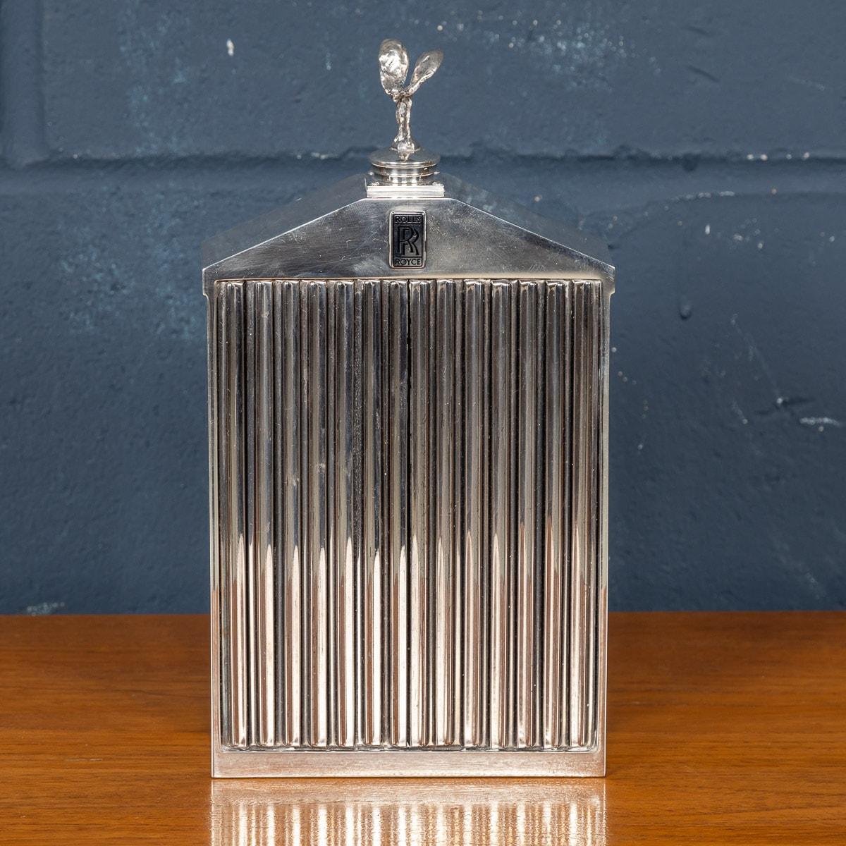 A vintage Rolls Royce chrome radiator grille decanter made by Classic Stable Ltd of Worthing with the classic radiator grille, bearing the Spirit of Ecstacy finial to the top. Made in the 1970s, the finish is of a very high quality, heavily chromed