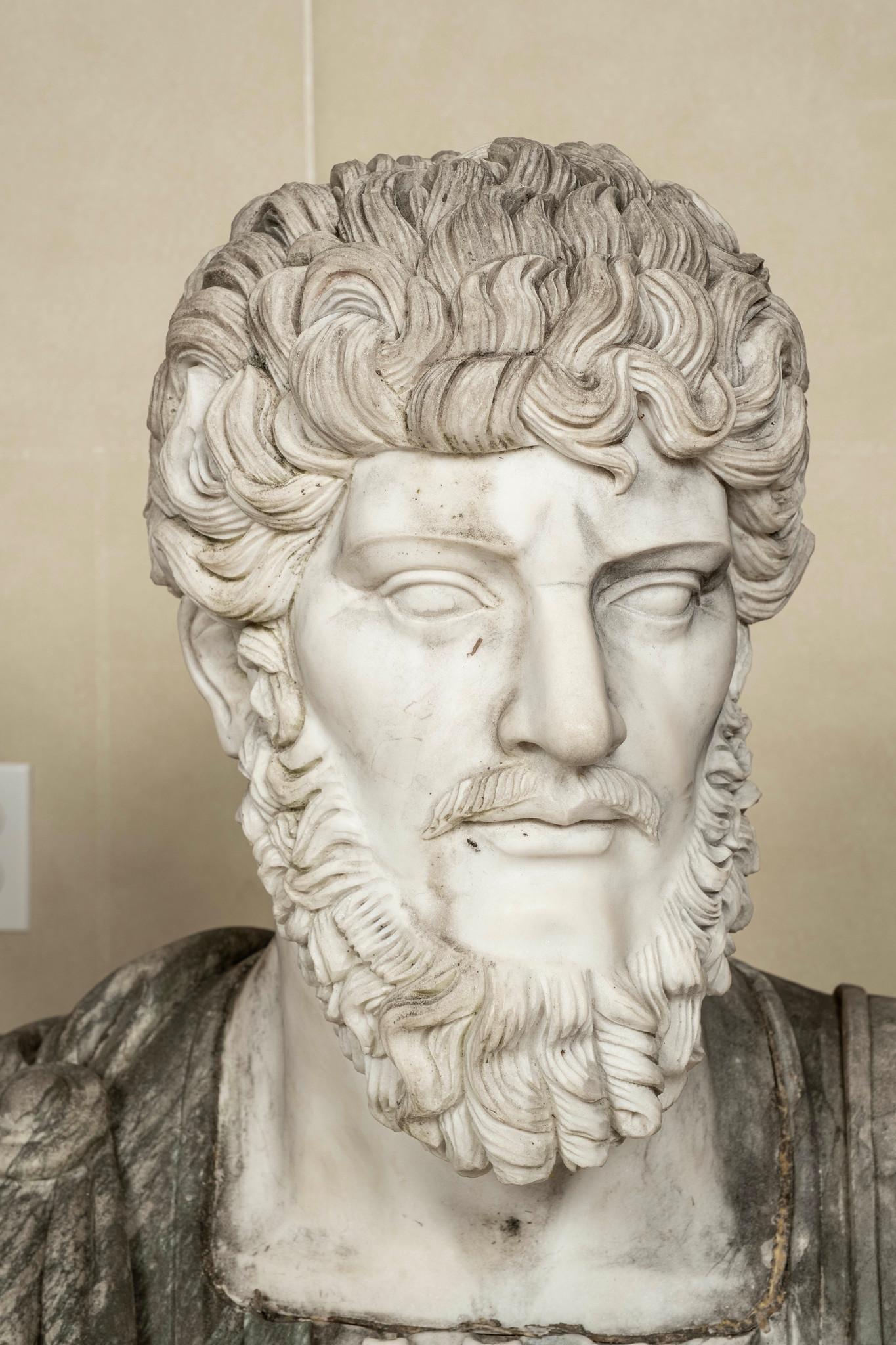 20th Century Neoclassical hand-carved Italian marble bust of Lucius Verus.