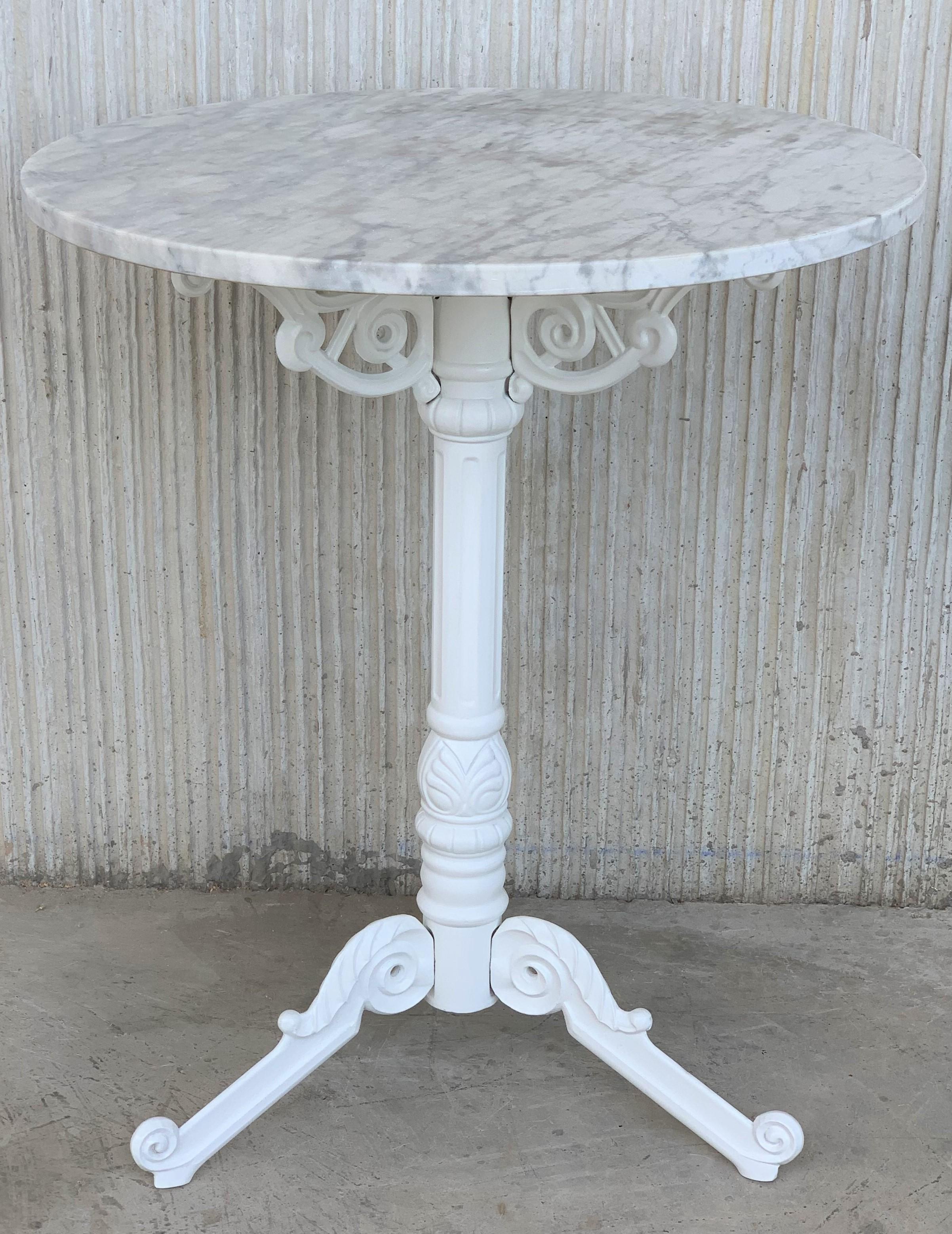 French style cast iron base with marble top garden table or bistro table.

Finely detailed cast iron base with white marble top.

Indoor and outdoor.