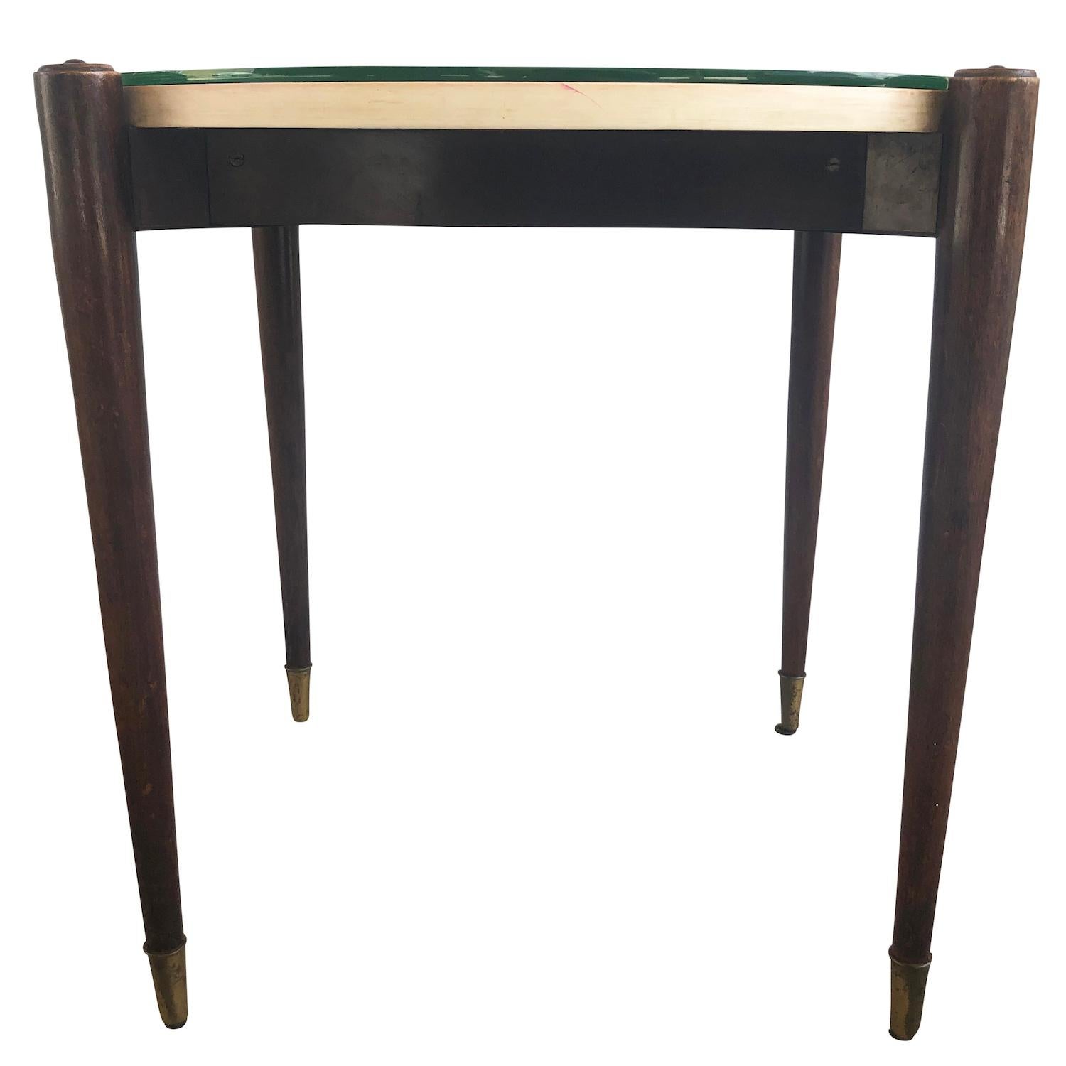A unique side table tapered on four legs, made of mahogany by Paolo Buffa. The table is in very good condition, underneath the glass top there is an insert panel with delicate floral inlay decor. Wear consistent with age and use, circa 1950