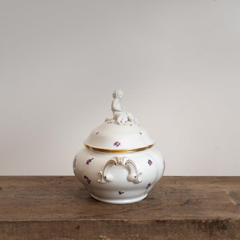20th century Royal Vienna Porcelain Tureen. Embellished with purple floral designs and gilding around the rim of the lid. A classic iteration of Royal Viennese porcelain design. Measures 10
