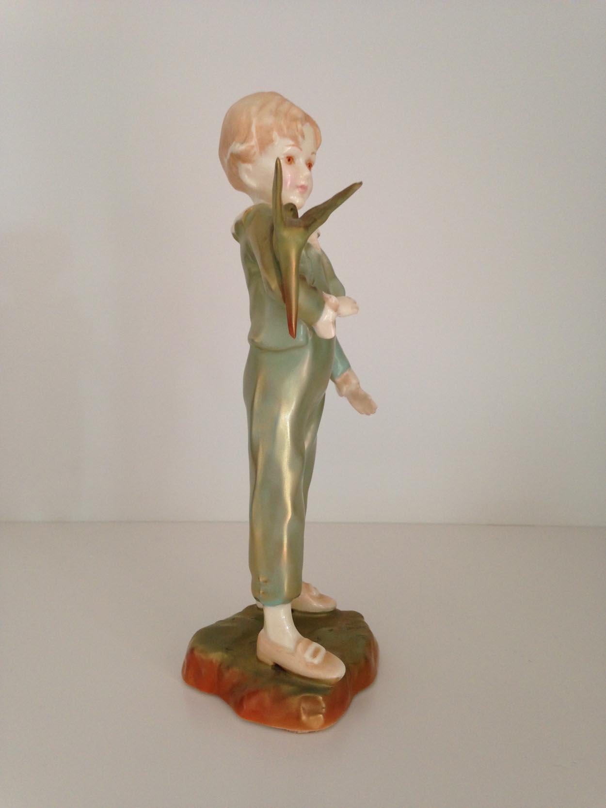 British Royal Worcester Figurine, Boy with Parakeet, 20th Century For Sale