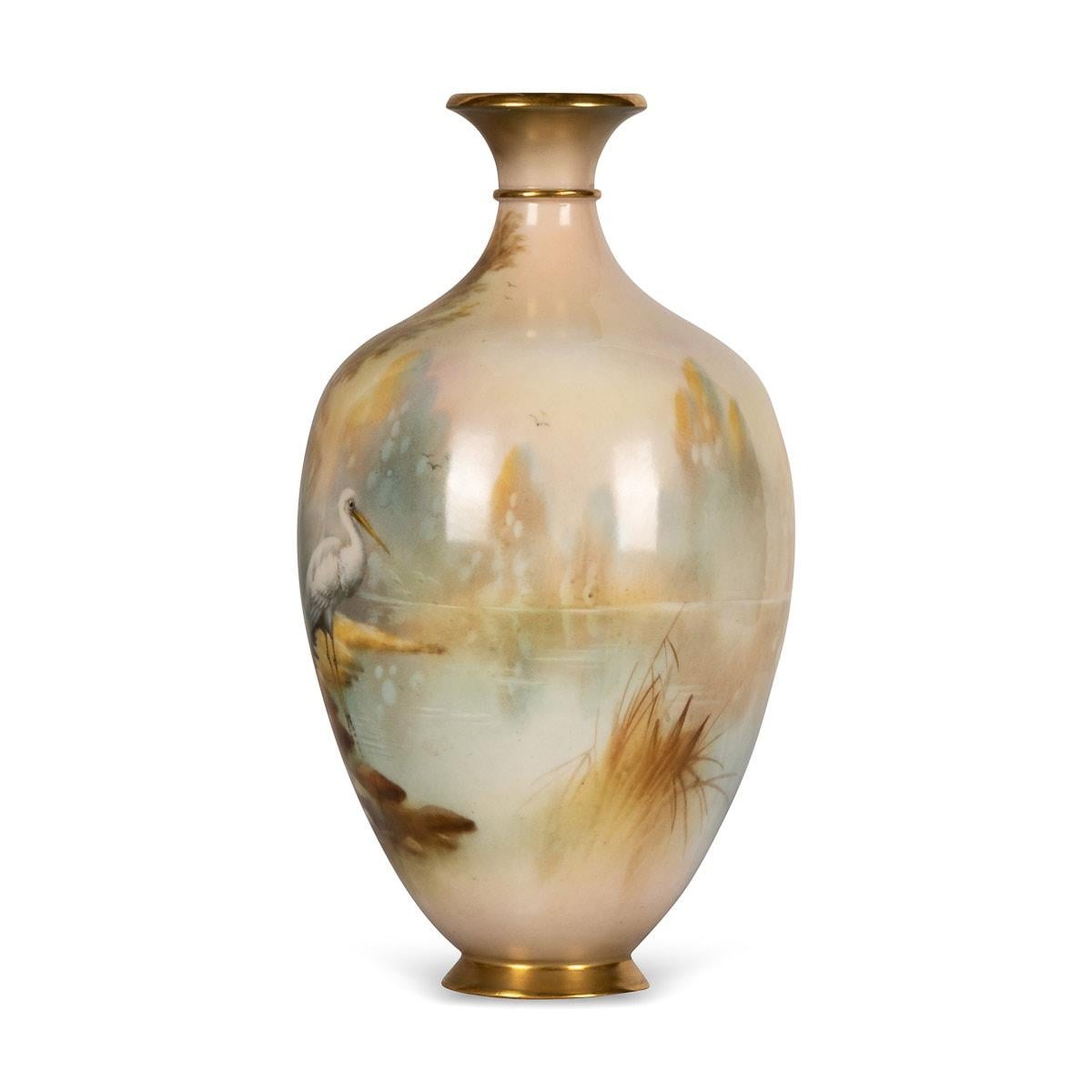 Antique early 20th Century Edwardian Royal Worcester vase. This item was created in the year 1910 in the English town of Worcester. Hand painted on this vase is a scene of wild plants and great egret waterbird, hunting in the waters edge for fish.