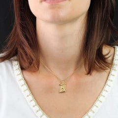 20th Century Ruby 18 Karat Yellow Gold  Augis Love Parchment Medal Pendant