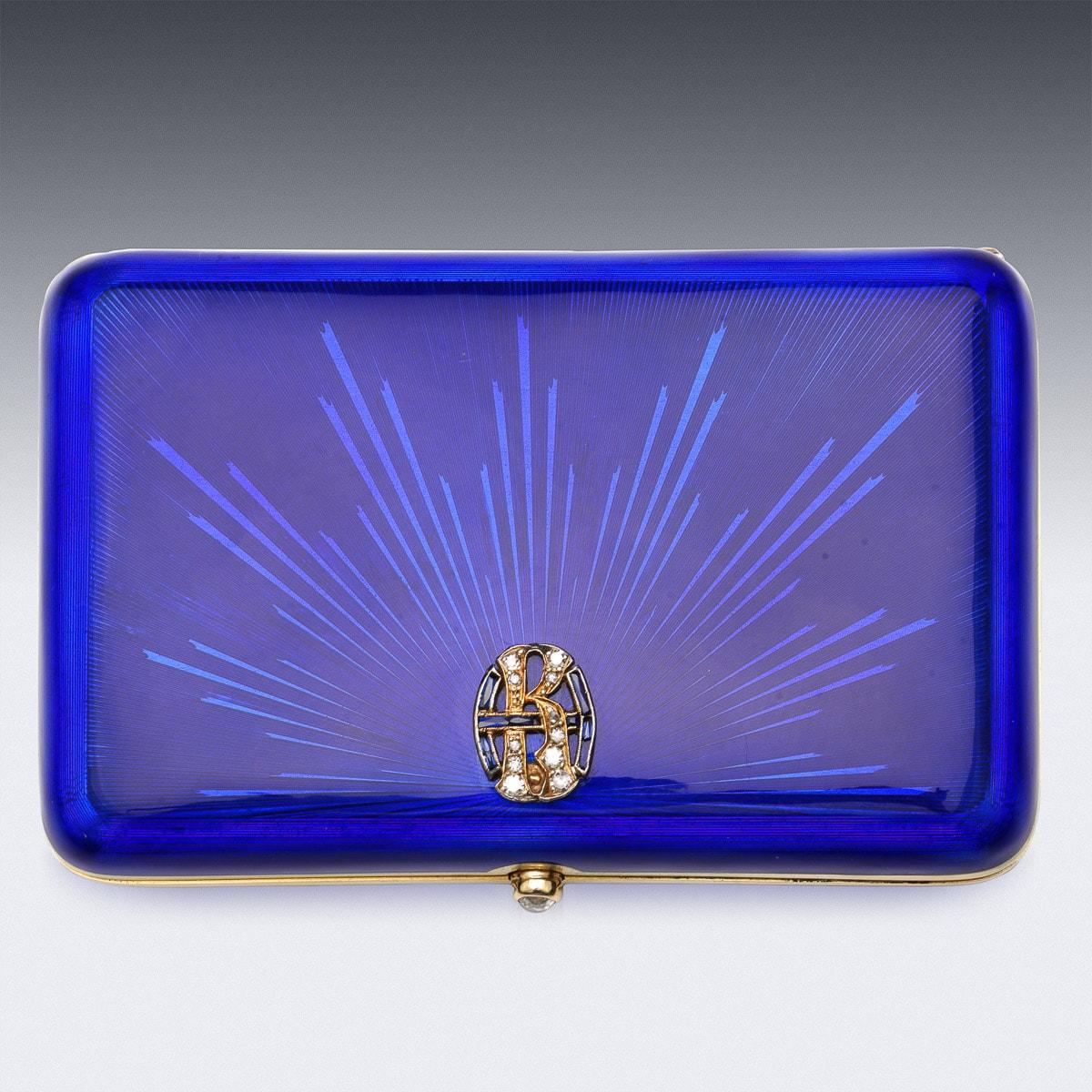 Antique early-20th Century Imperial Russian Faberge cigarette case, applied with vibrant royal blue guilloche enamel on gold, rose-cut diamond-set thumbpiece and lid applied with a sapphire and diamond KH initials.

Hallmarked Russian gold 56 (585