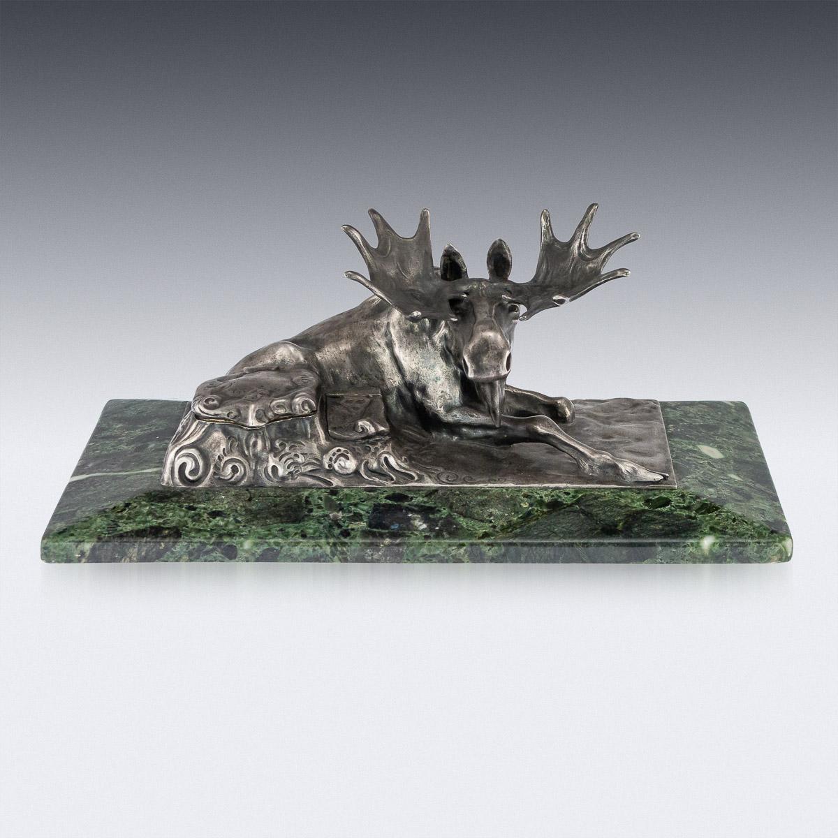 Antique early 20th century imperial Russian Faberge exceptional solid silver mounted on green marble inkstand. Of rectangular shape, vibrant green marble body mounted with a seating moose, next to an inkwell and stamp compartment decorated with