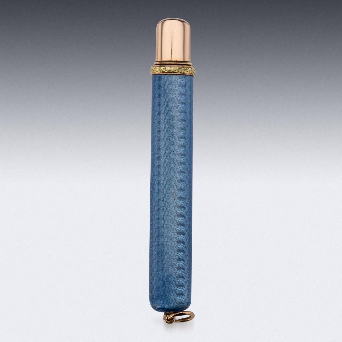 Antique early-20th century Imperial Russian two-colour gold-mounted guilloche enamel pencil holder, of flattened rectangular form, enameled in translucent blue over a wavy guilloché ground, the gold collar decorated with gold leaf boarder.