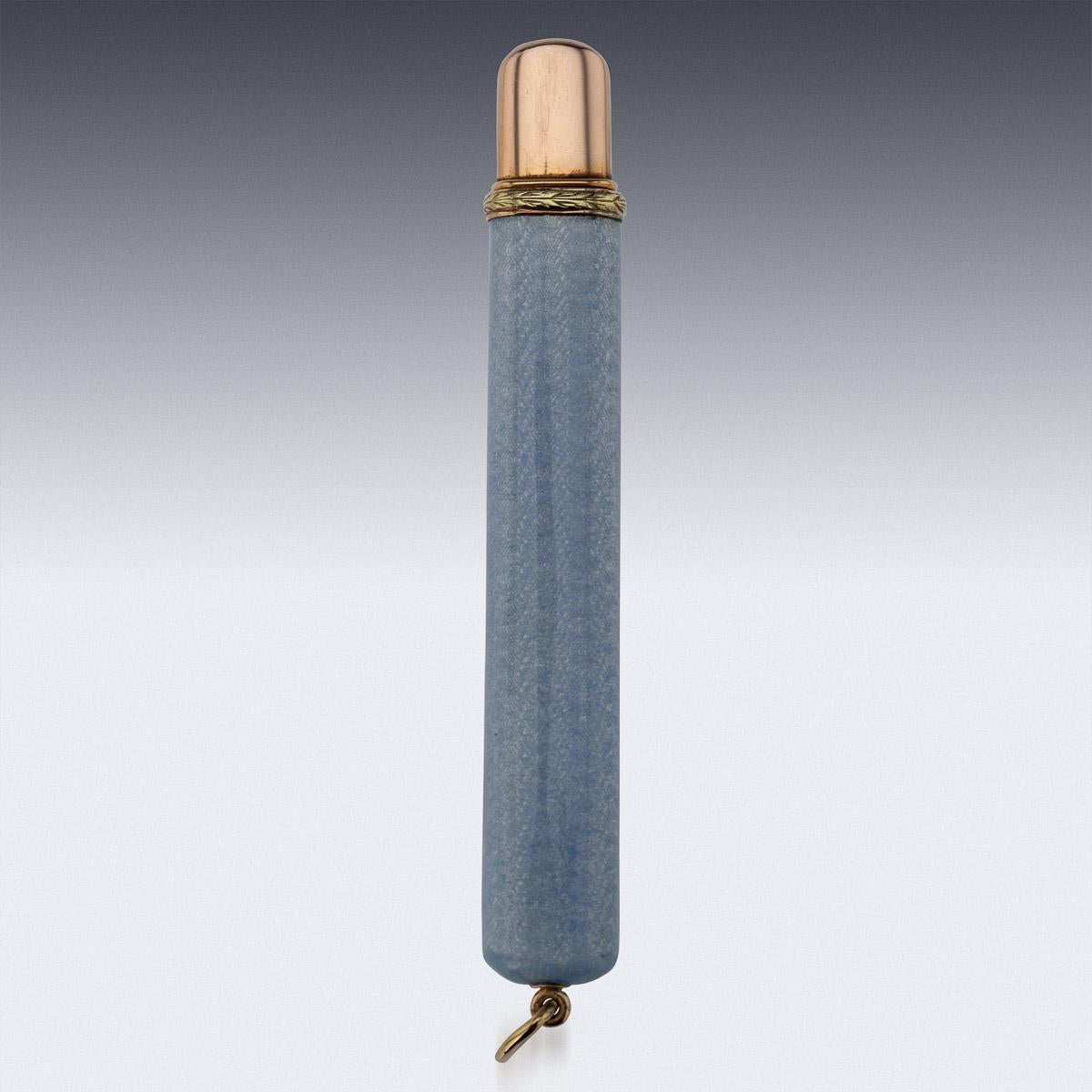 Antique early-20th Century Imperial Russian two-colour gold-mounted guilloche enamel pencil holder, of flattened rectangular form, enameled in translucent ice blue over a wavy guilloché ground, the gold collar decorated with gold leaf boarder.