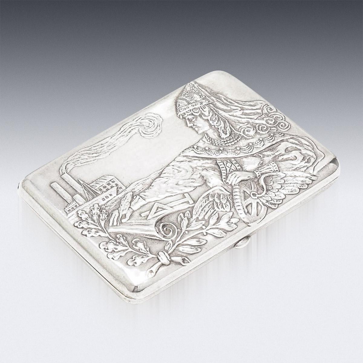 19th Century Imperial Russian silver cigarette case, with richly parcel gilt interior, of rectangular form with curved corners, the hinged cover beautifully decorated depicting a person in Pan-Slavic dress, with a push release button.
Hallmarked