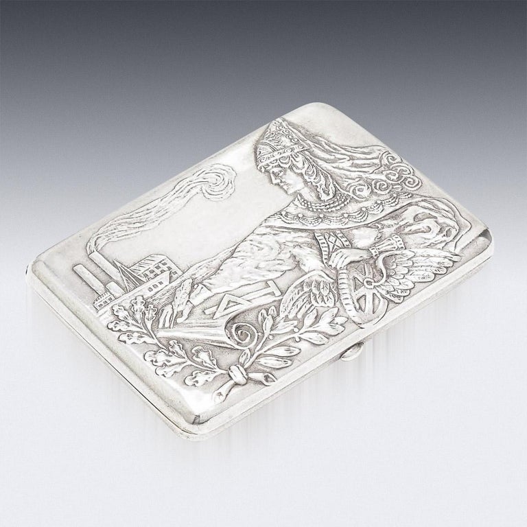 19th Century Imperial Russian silver cigarette case, with richly parcel gilt interior, of rectangular form with curved corners, the hinged cover beautifully decorated depicting a person in Pan-Slavic dress, with a push release button.
Hallmarked