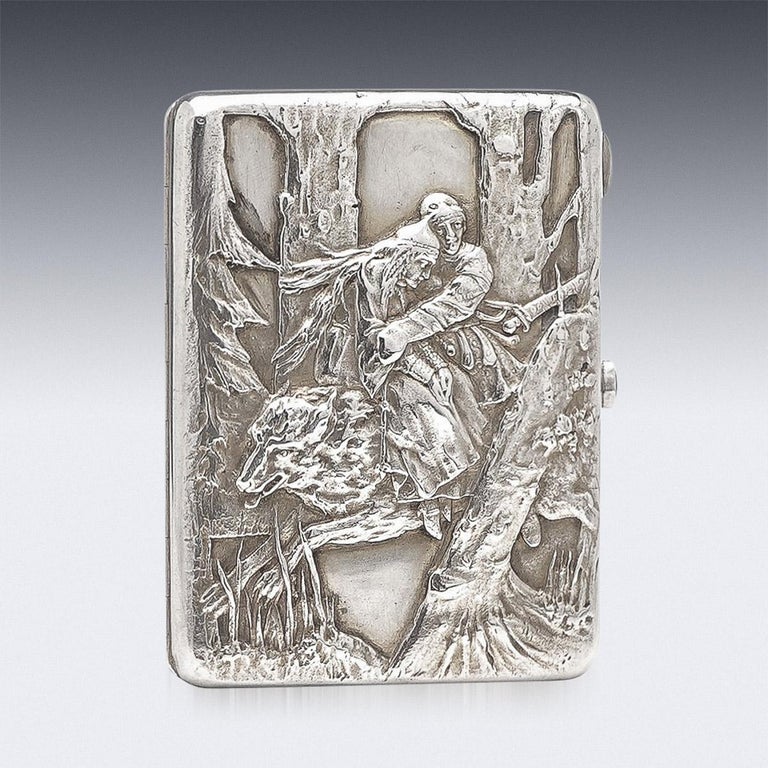 19th Century Imperial Russian silver cigarette case, with richly parcel gilt interior, of rectangular form with curved corners, the hinged cover beautifully decorated depicting with Pan- Slavic motive from the famous painting by Victor Vasnetsov