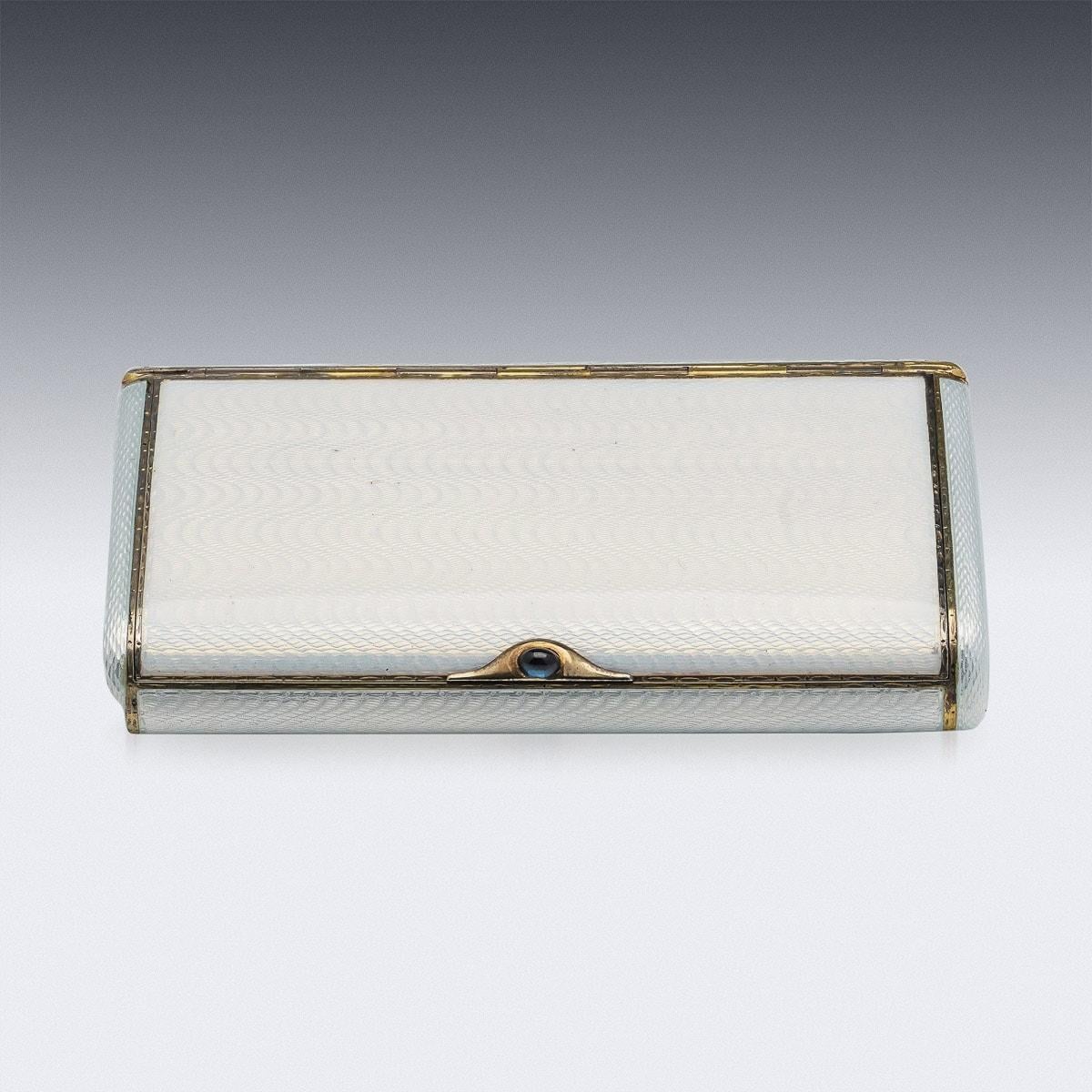 Antique early-20th century Imperial Russian silver-gilt & guilloche enamel cigarette case, rectangular form with rounded corners, body enameled in translucent opalescent white over a engine-turned ground, the gold thumb piece mounted with finely set