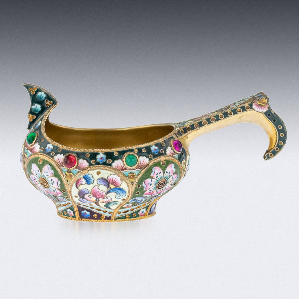 Antique early 20th century Imperial Russian solid silver and shaded cloisonne' enamel Kovsh, of traditional oval form, with raised prow and hook handle, the body beautifully decorated with various shaded polychrome cloisonne' enamel with stylised