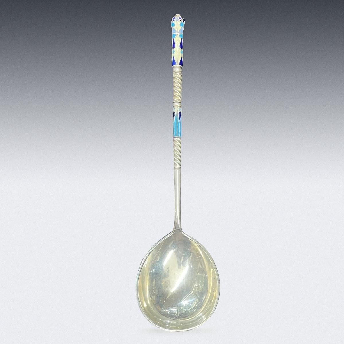 Antique early 20th Century Imperial Russian solid silver and shaded cloisonne' enamel spoon, the round bowl is applied on reverse with doubled headed painted enamel eagle. Hallmarked Russian silver 84 (875 standard), Moscow, Makers Mark in Cyrilic