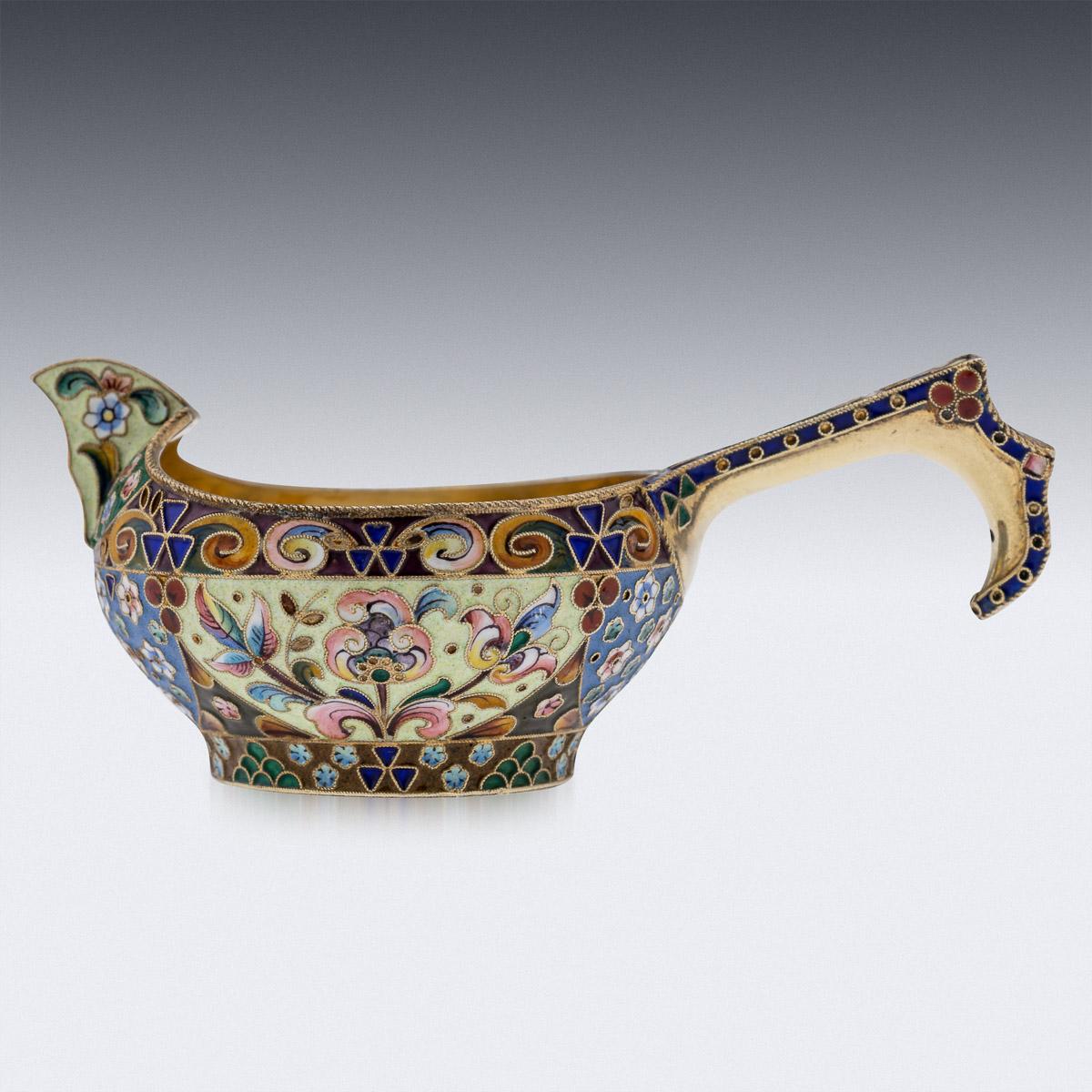 20th century Imperial Russian silver & shaded cloisonne' enamel Kovsh, of traditional oval form, with raised prow and hook handle, the body beautifully decorated with various shaded polychrome cloisonne' enamel with stylised scrolling foliage and