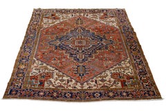 Rostfarbener antiker Heriz-Wollteppich des 20. Jahrhunderts, handgefertigt mit Medaillon-Motiv