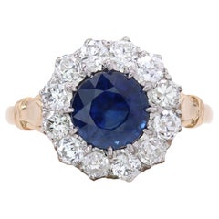 20ème siècle Bague marguerite saphir diamants or jaune 18 carats platine