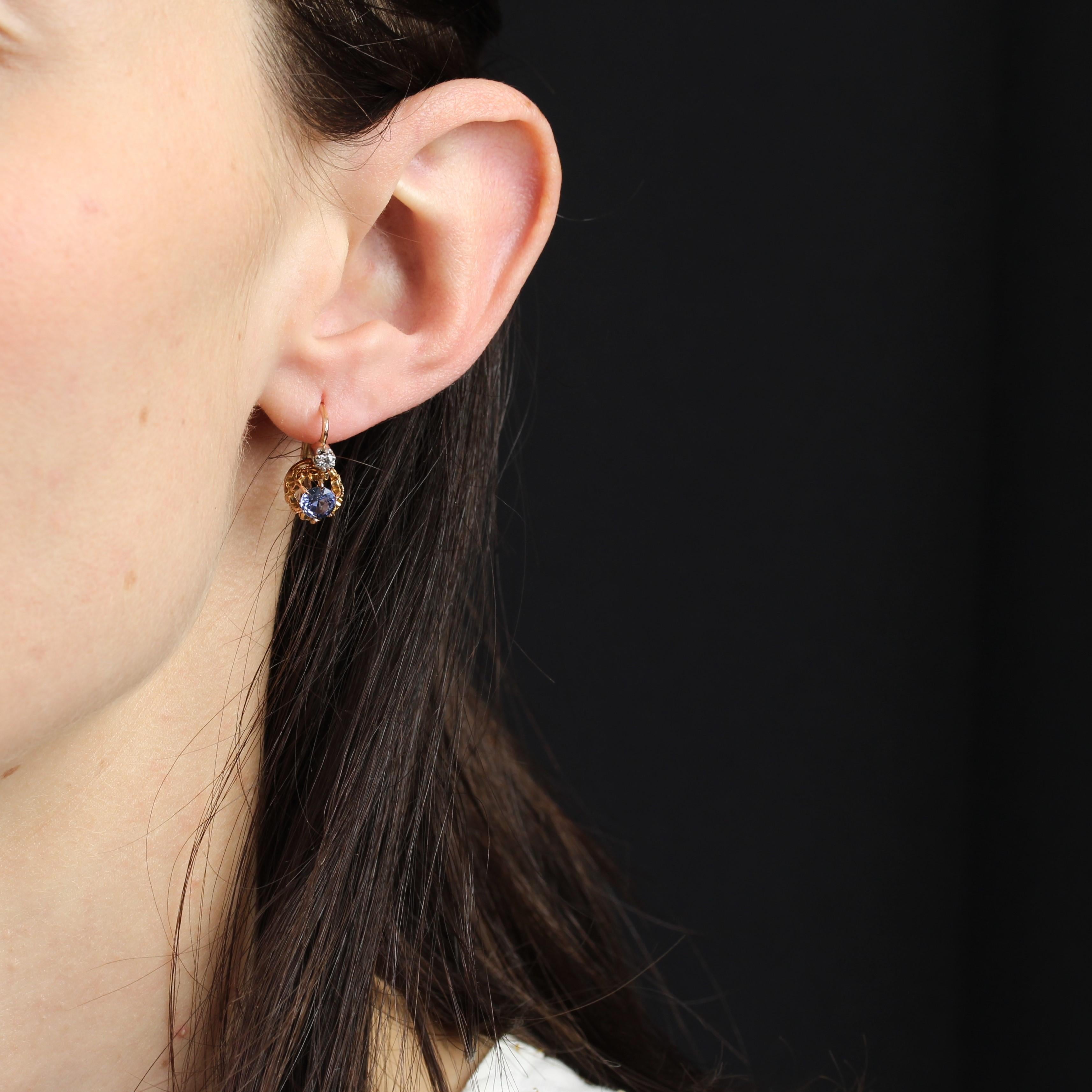 For pierced ears.
Earrings in 18 karat rose gold, owl hallmark and platinum.
Charming antique earrings set with an antique-fashioned brilliant-cut diamond on the front on platinum prongs, and a round blue sapphire underneath in a fleur-de-lisle