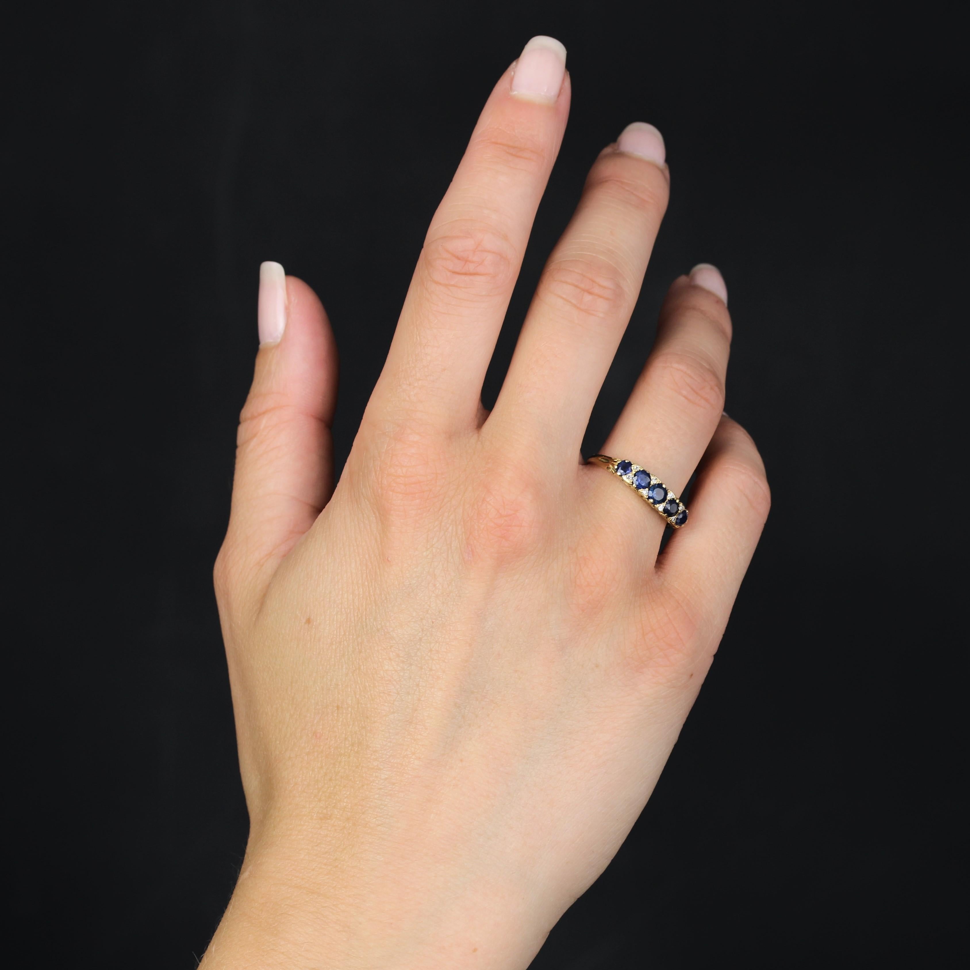 Taille ronde 20ème siècle Bague jarretière en or jaune 18 carats saphirs diamants