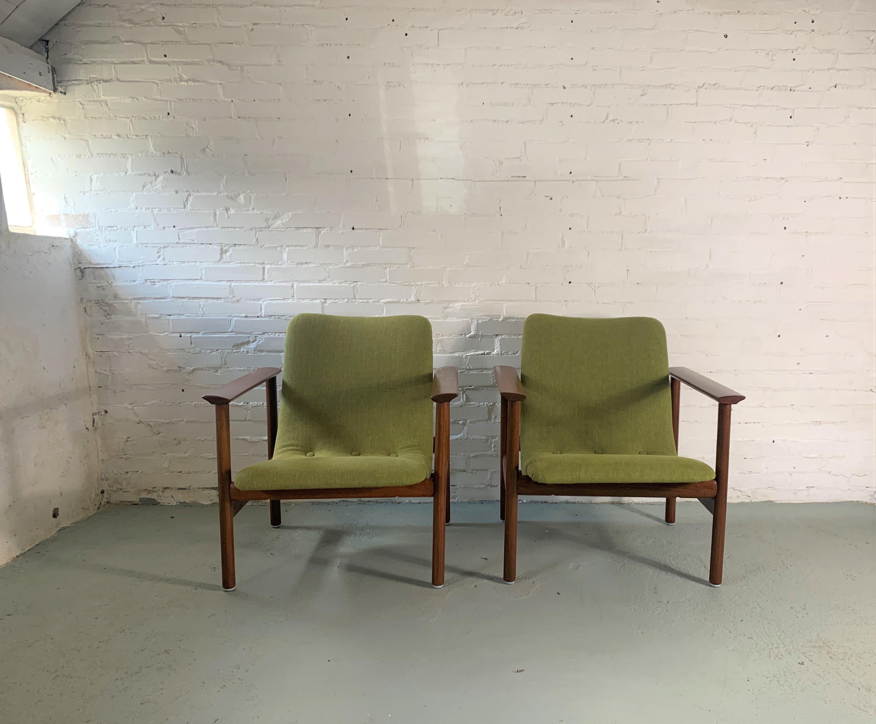 Teak frame and new reupholstered beautiful Scandinavian modern armchairs. The style is reminiscent of the works of Finn Juhl and Fredrik Kayser. Very comfortable.