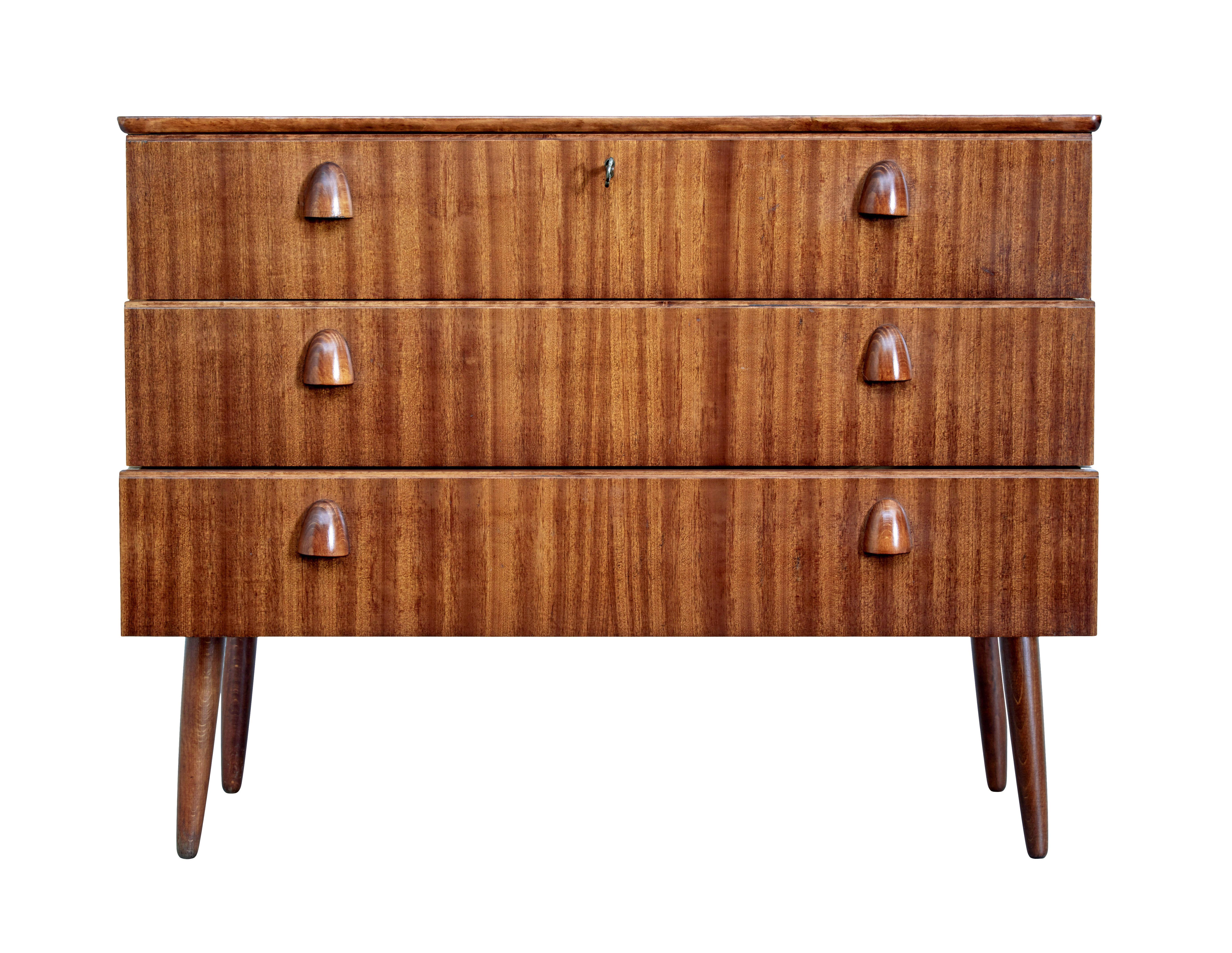 Carved 20th century Scandinavian teak chest of drawers For Sale
