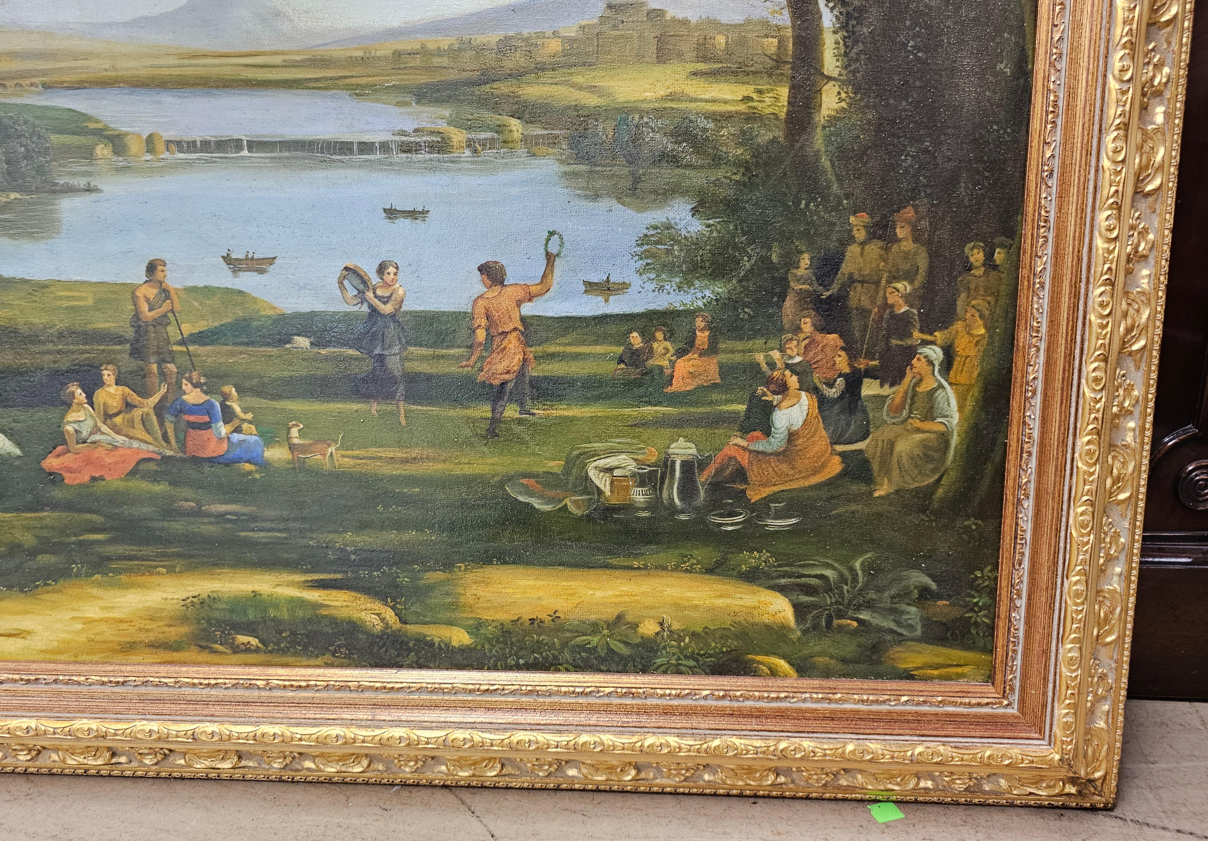 A large, beautiful and well made 20th Century School Oil on canvas frame depicting a landscape beside a river entertainment scene. Measures 54.25