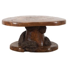 Tavolino scultoreo in olmo del XX secolo