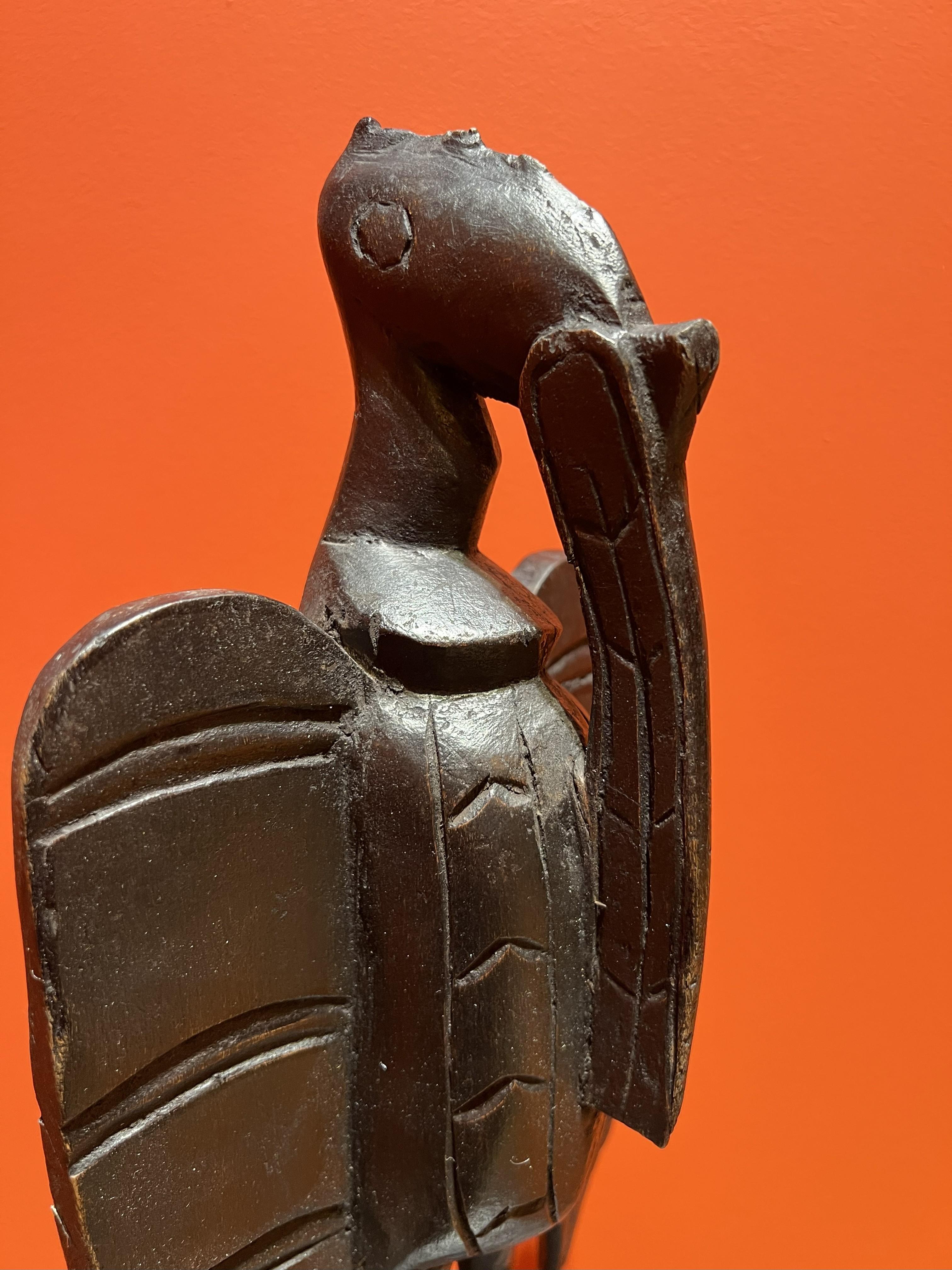 Estatua de Pájaro Senufo o Cálao del Siglo XX Madera Tallada Porpianong África Occidental Maliense en venta