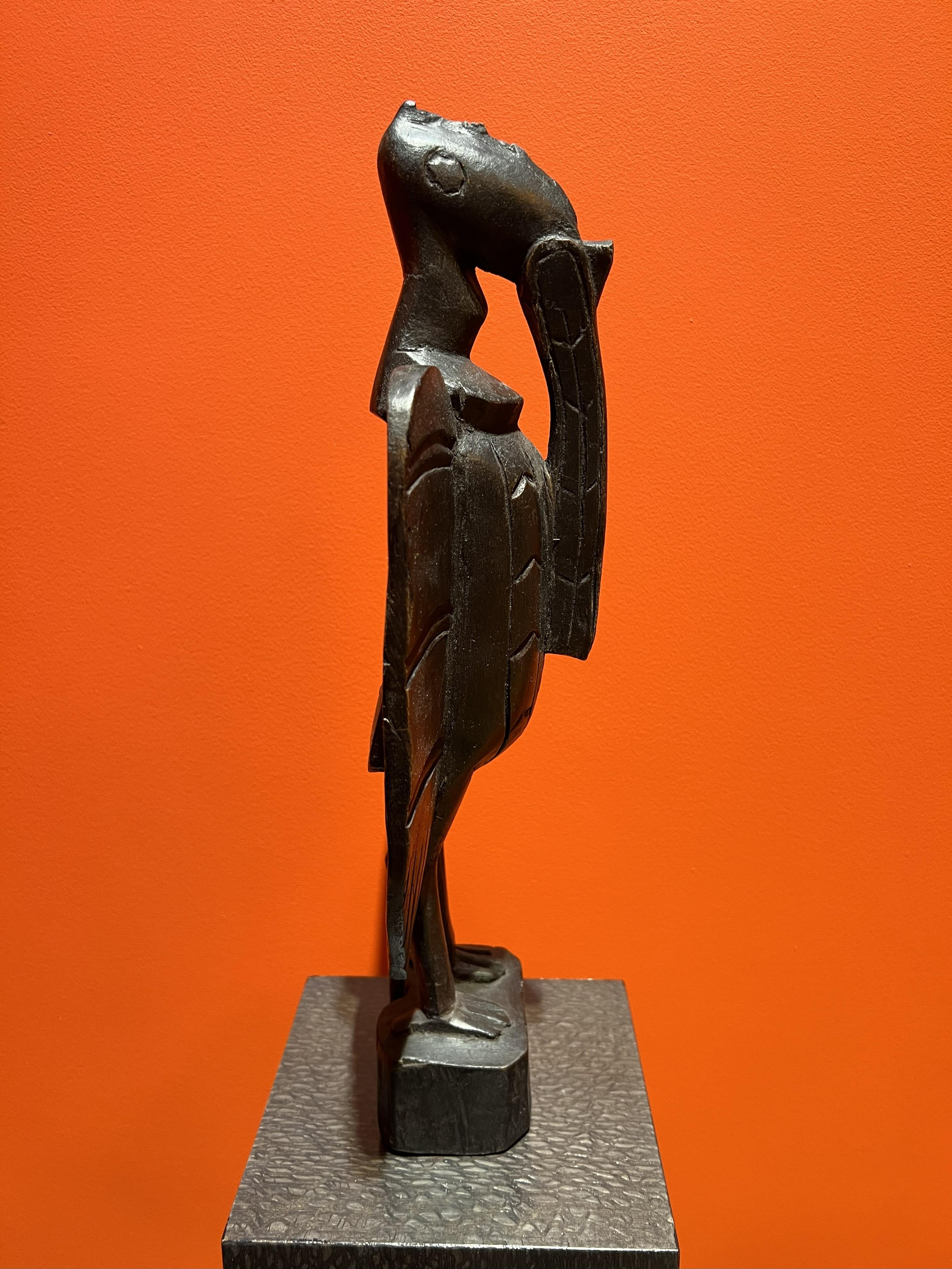 Estatua de Pájaro Senufo o Cálao del Siglo XX Madera Tallada Porpianong África Occidental Tallado a mano en venta