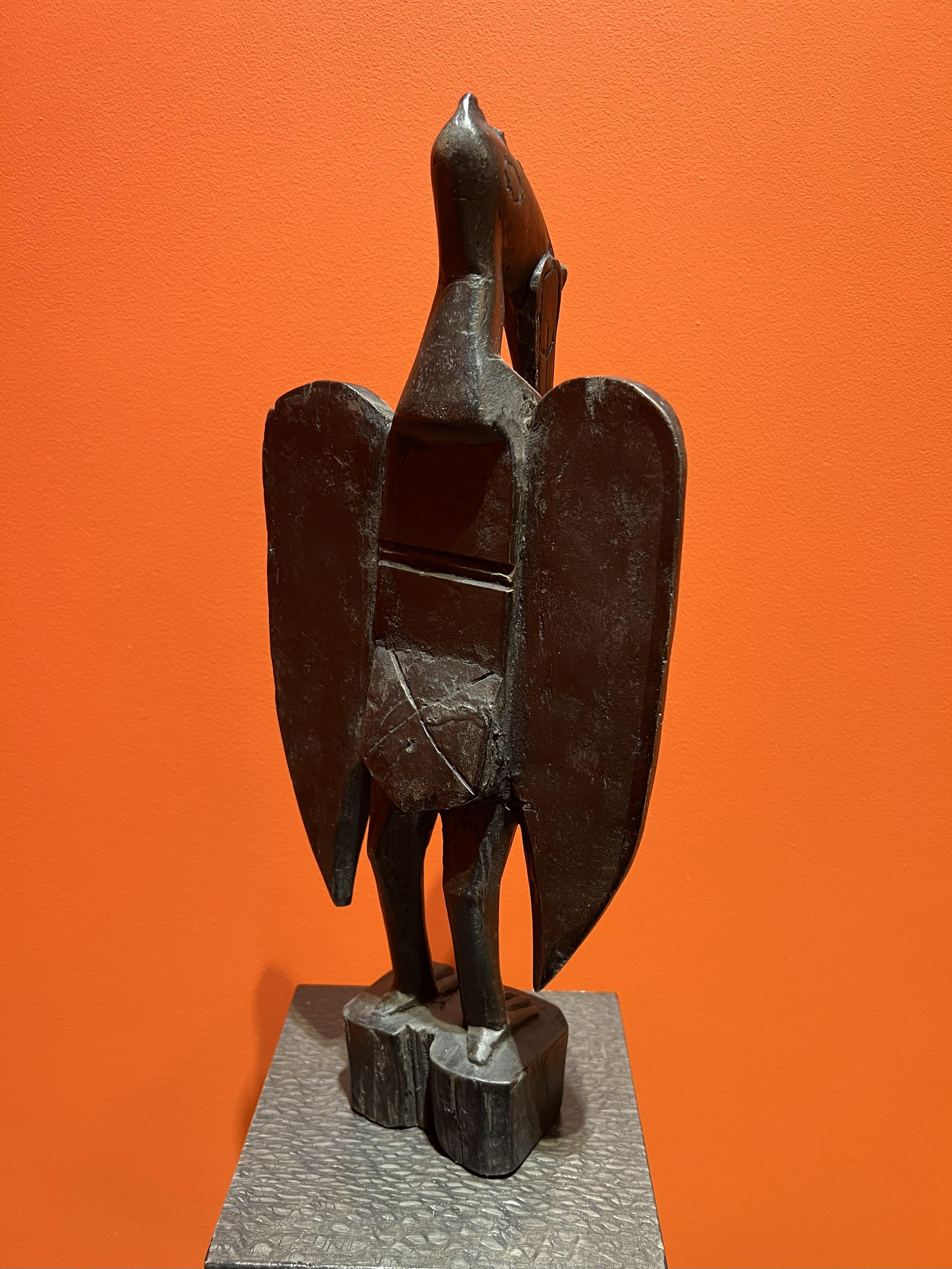 Estatua de Pájaro Senufo o Cálao del Siglo XX Madera Tallada Porpianong África Occidental finales del siglo XX en venta