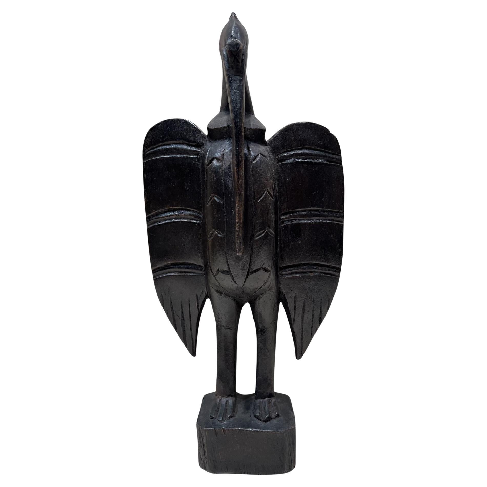 Statua di uccello o bucero Senufo del XX secolo, in legno intagliato di Porpianong, Africa occidentale