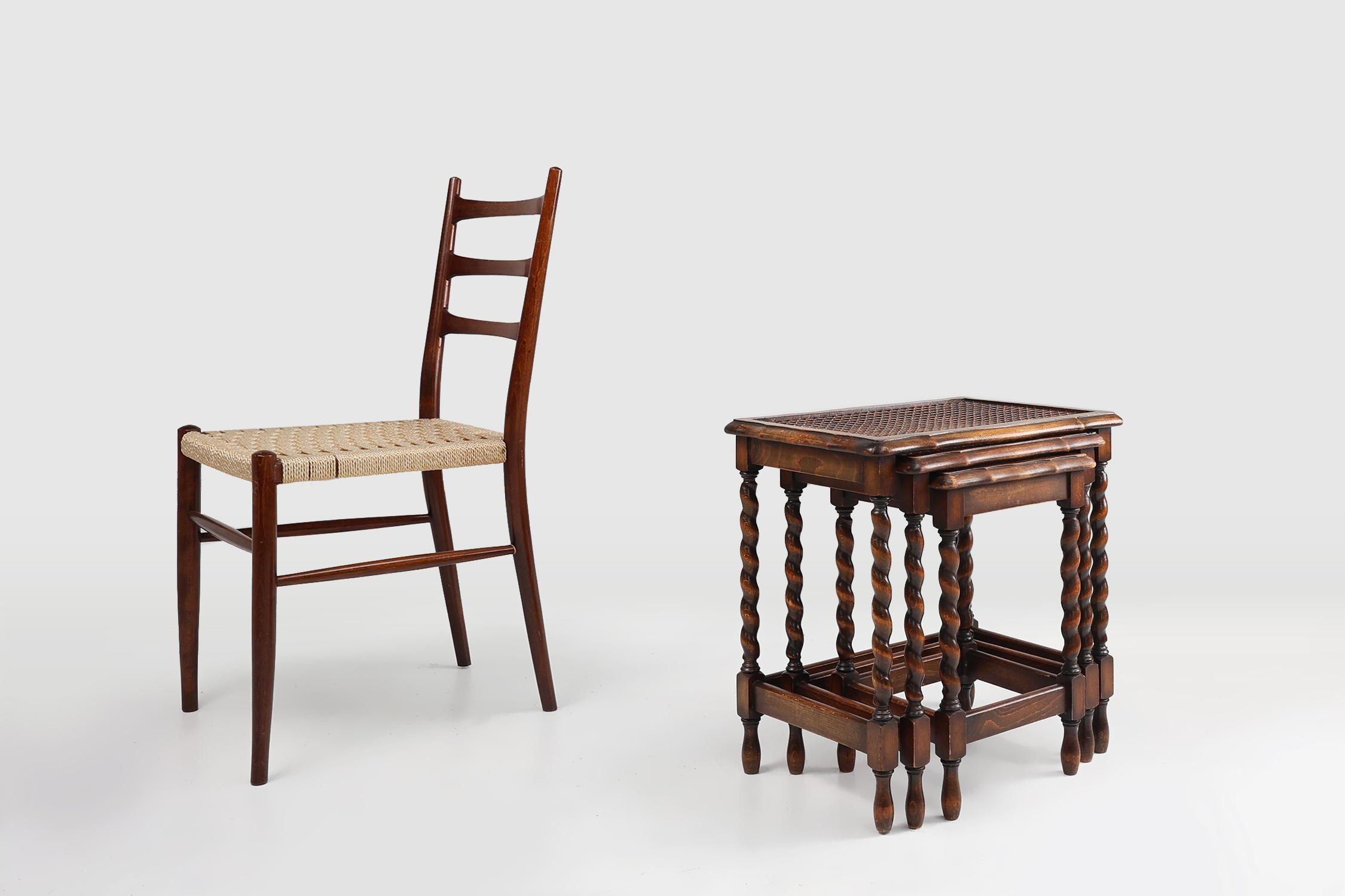 Belgium / 1950 / set of 3 nesting tables / oak, rattan / Antique / Mid-century

A timeless set of three nesting tables on oak turned legs and with rattan top. Each table features a beautifully crafted wooden top that showcases the natural grain and