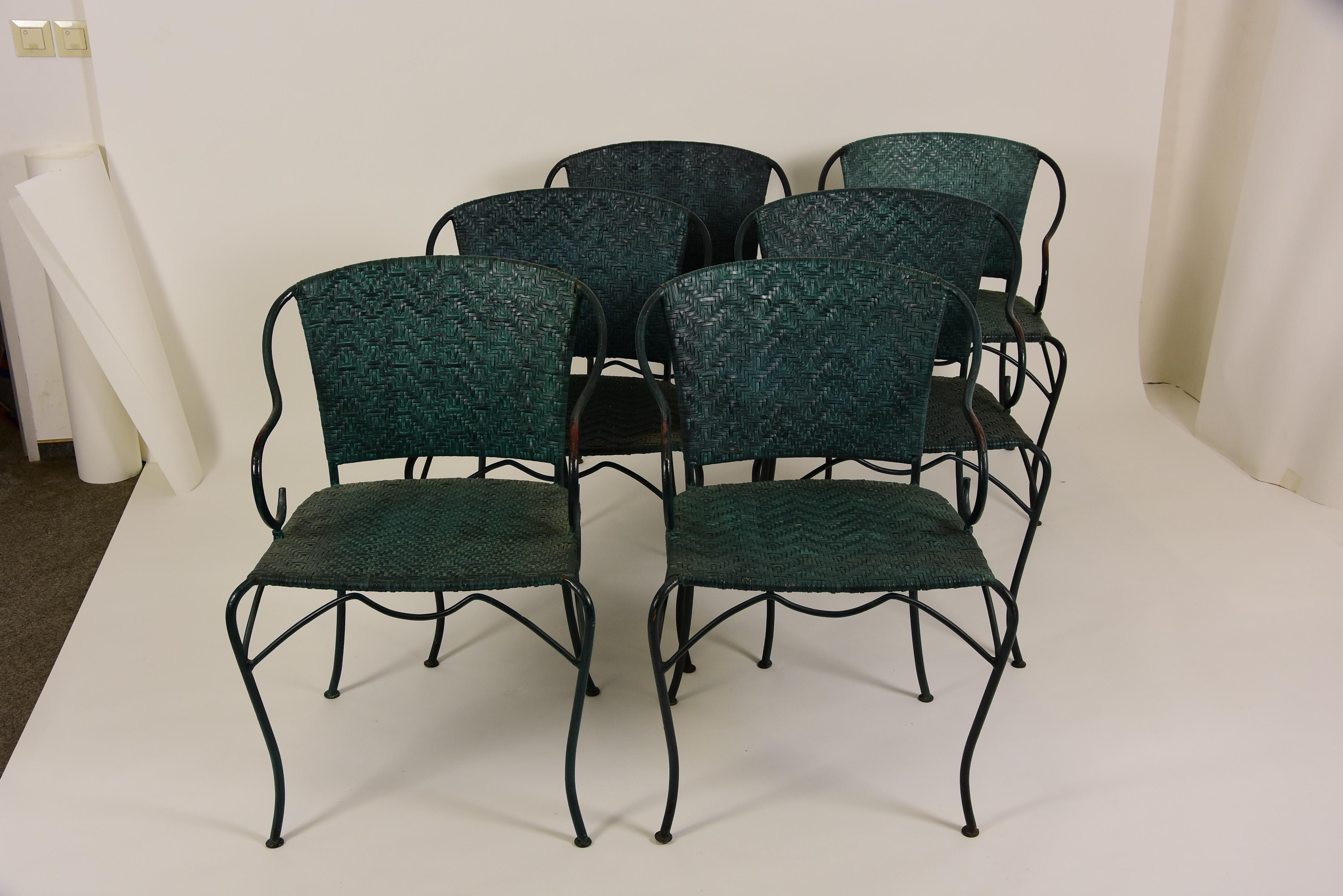Rare set of six Anatol iron armchairs, with green buffalo leather braided seat and backrest. The iron frame has been wiped green in vintage style. The buffalo leather has the same green tone as the iron frame. This armchair is made of solid iron