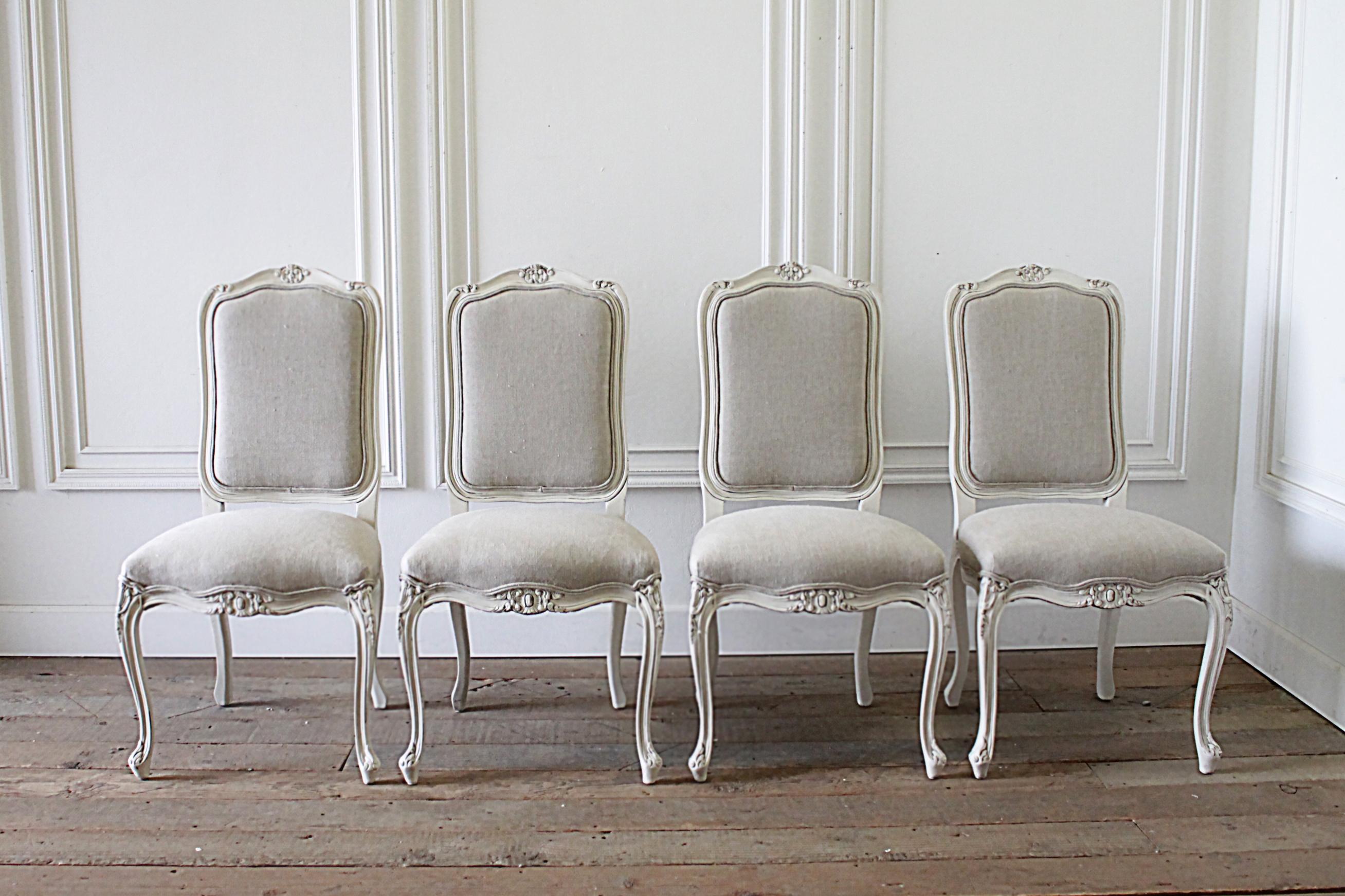 20th century set of 6 French Country painted and linen upholstered dining chairs
Painted in our oyster white finish, with subtle distressed edges, and finished with an antique glazed patina, these French Country dining chairs are solid and sturdy