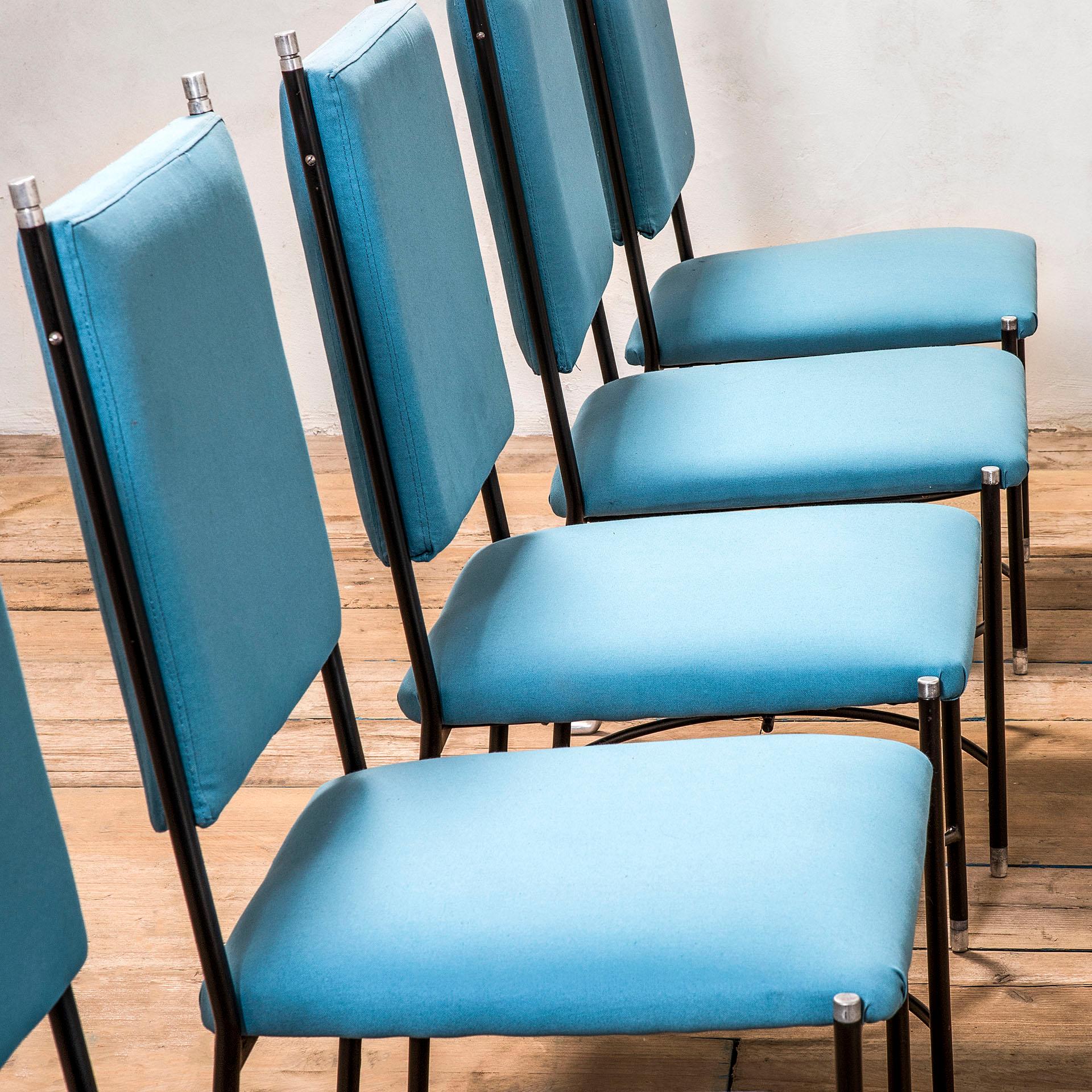 Set of eight dining chairs with wonderful structure in metal, not only with a structural aim but also very decorative. Designed by M. Blech and A: Bertrand in '50s. The seatings and the backrests are covered by a light blue fabric. The feet of each
