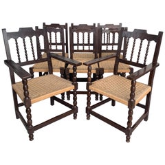 20th Century Set of Eight Catalan Chairs/Armchairs in Walnut and Caned Seats