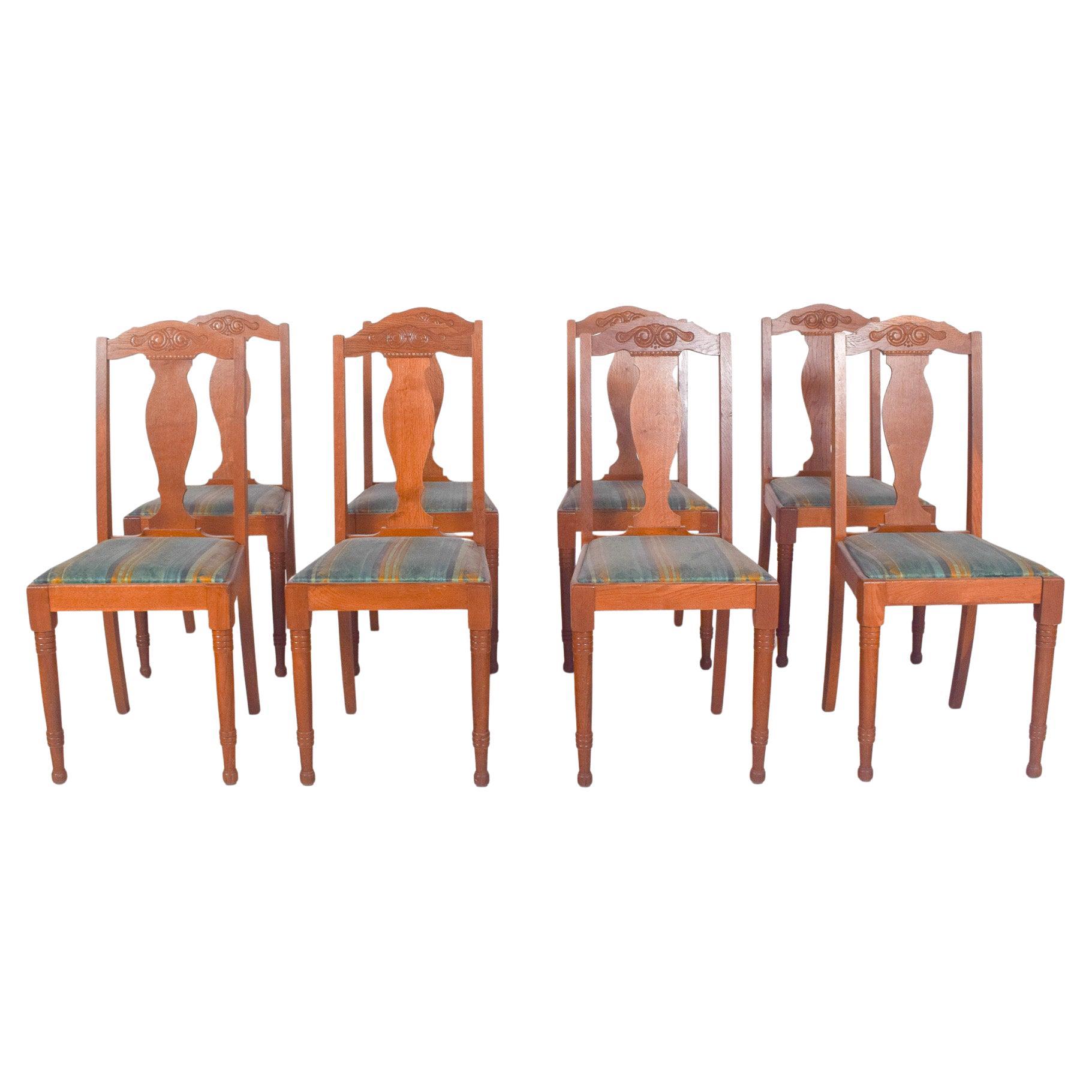 Siglo XX Conjunto de ocho sillas rústicas danesas de roble en venta
