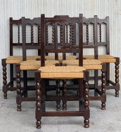 20th Century Set of Six Catalan Chairs in Carved Walnut and Caned Seats