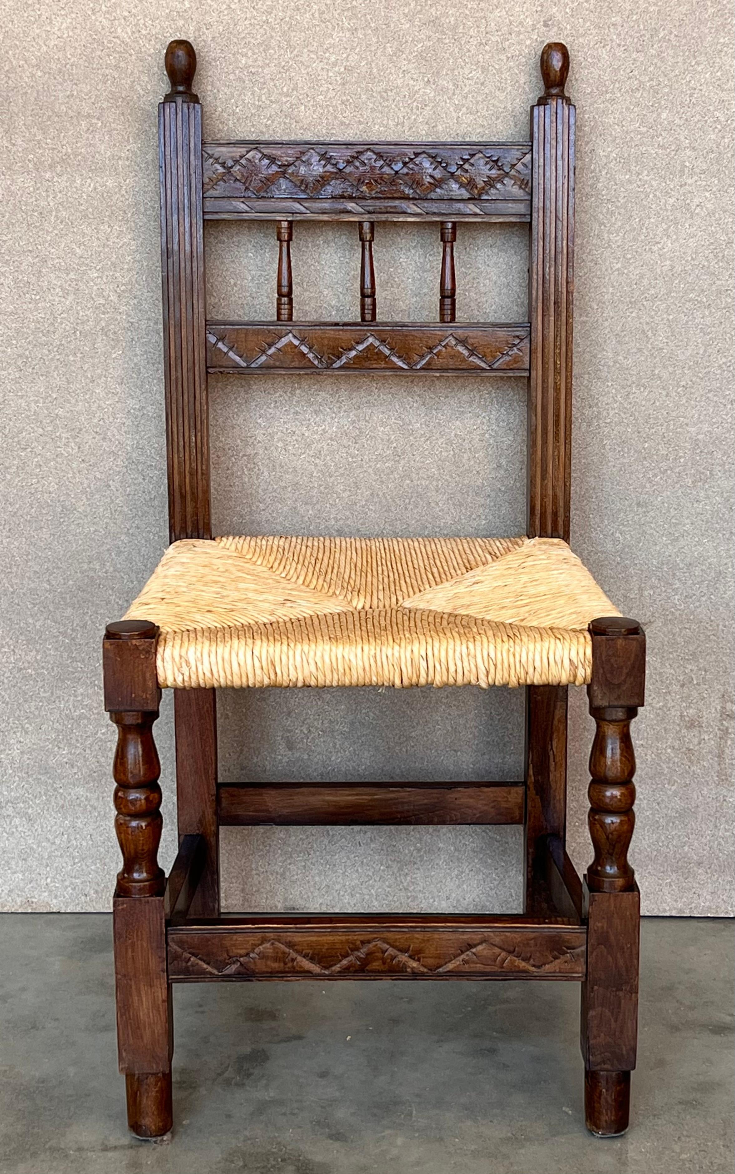 20th century set of six Catalan chairs in carved walnut and caned seats.
Country chairs.