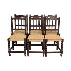 20th Century Set of Six Catalan Chairs in Carved Walnut and Caned Seats