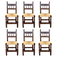 20th Century Set of Six Catalan Chairs in Carved Walnut and Caned Seats