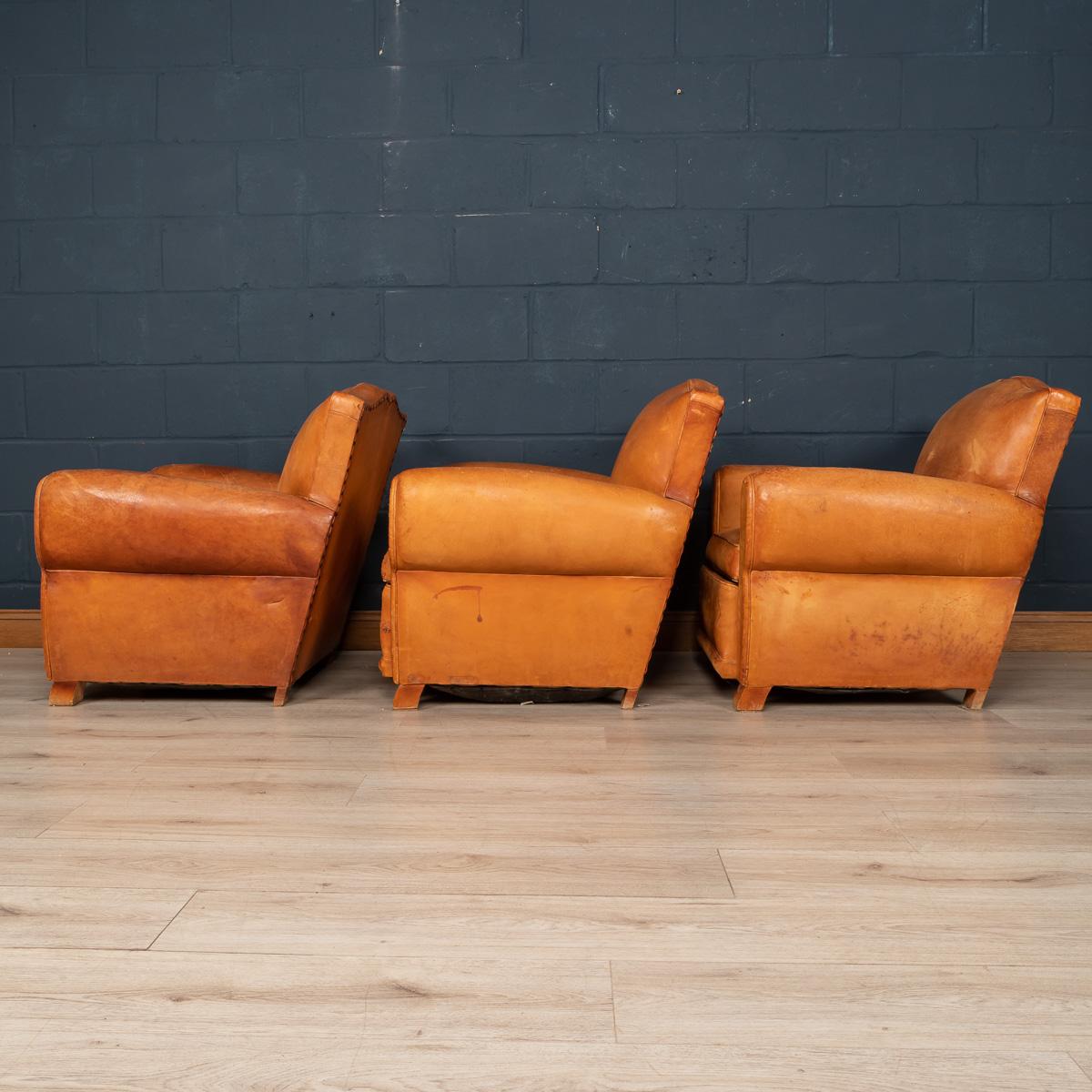 A gorgeous set of three French leather club chairs, circa 1950. Structurally sound, these armchairs have perennially oozed class and sophistication from the day they were made in the middle of the 20th century through to the modern
