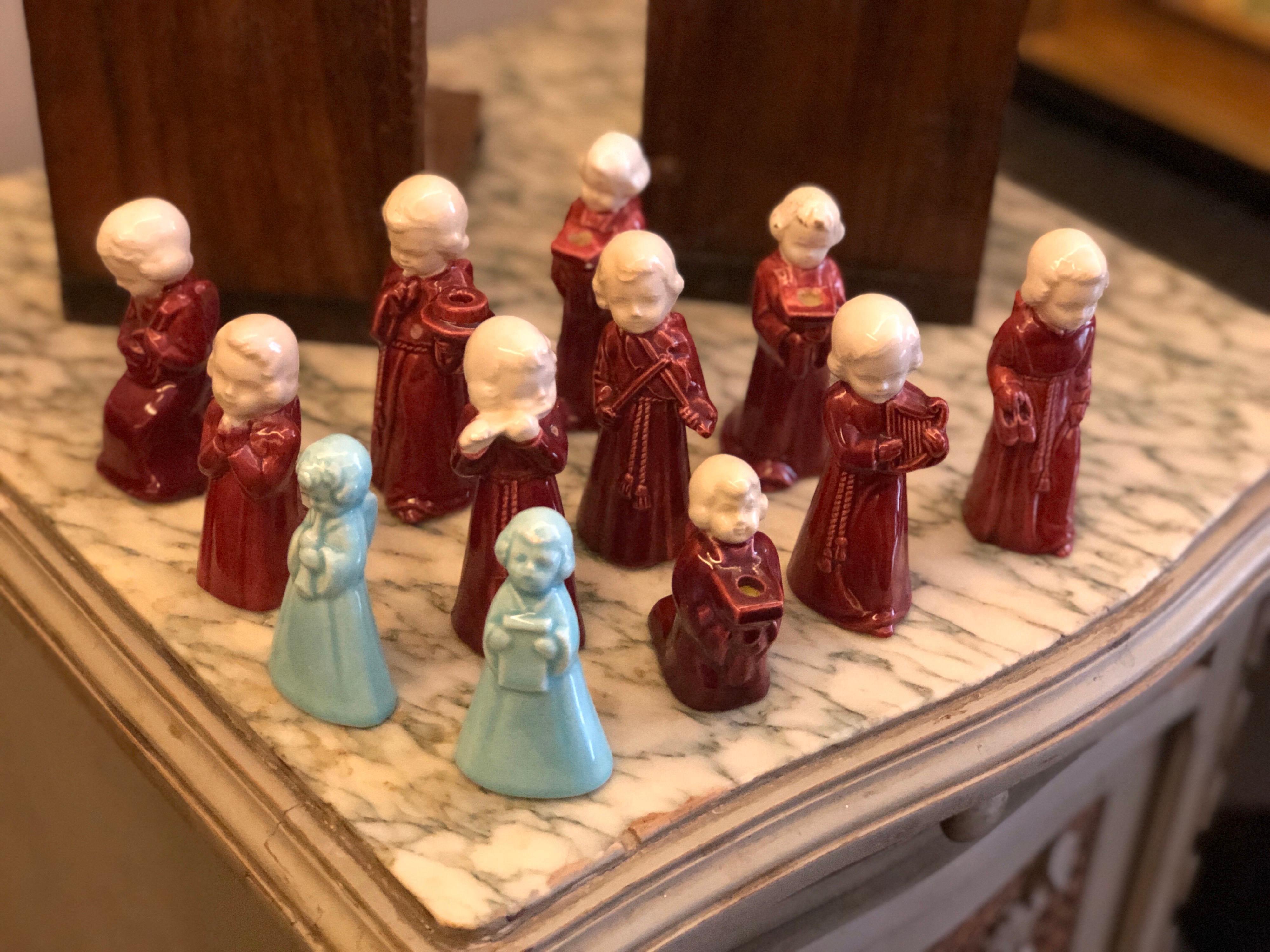 French set of twelve handmade ceramic angels, musicians,
France,
circa 1950.