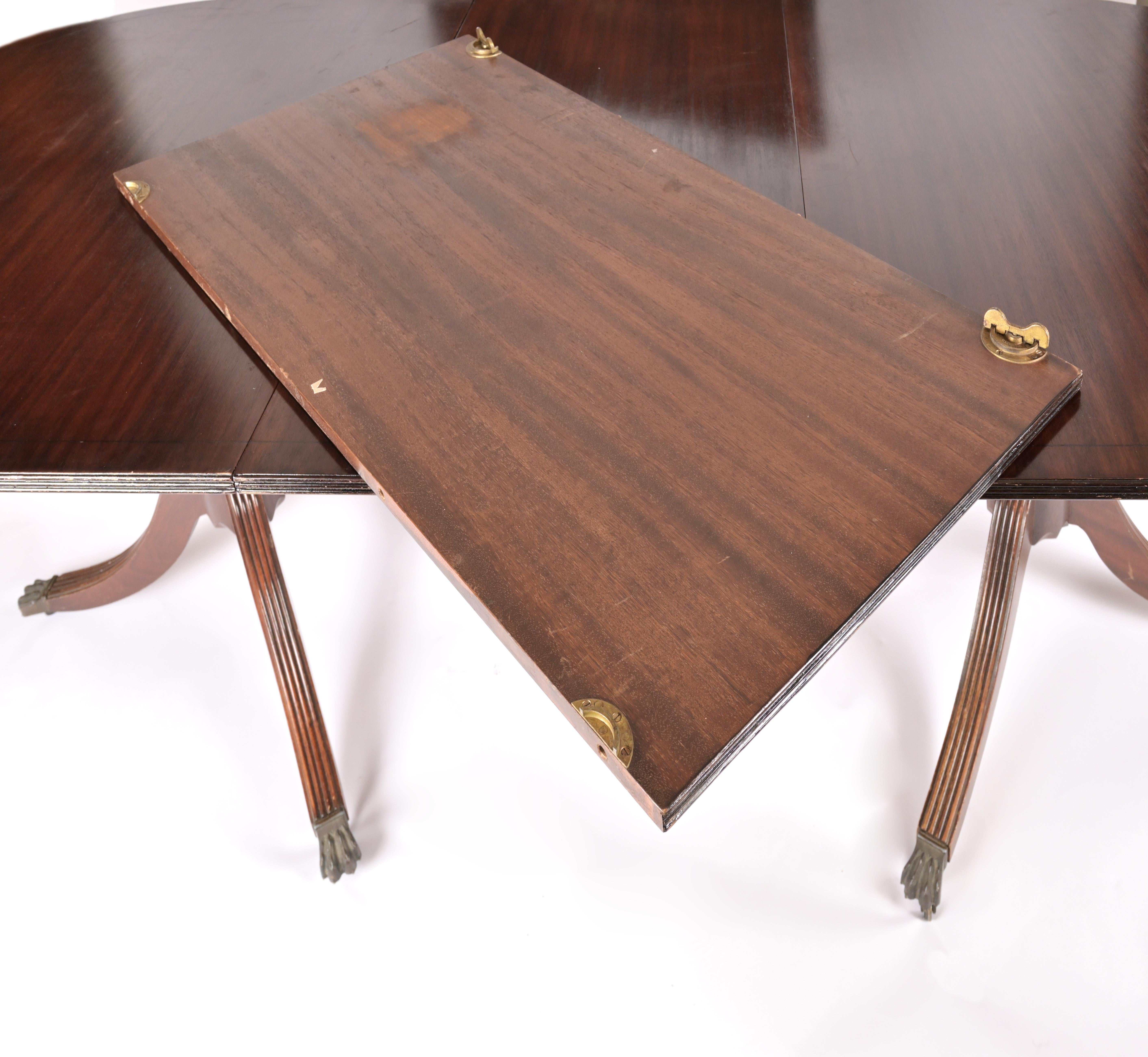 Brass 20th Century Sheraton Style Pedestal Base Mahogany Dining Table For Sale