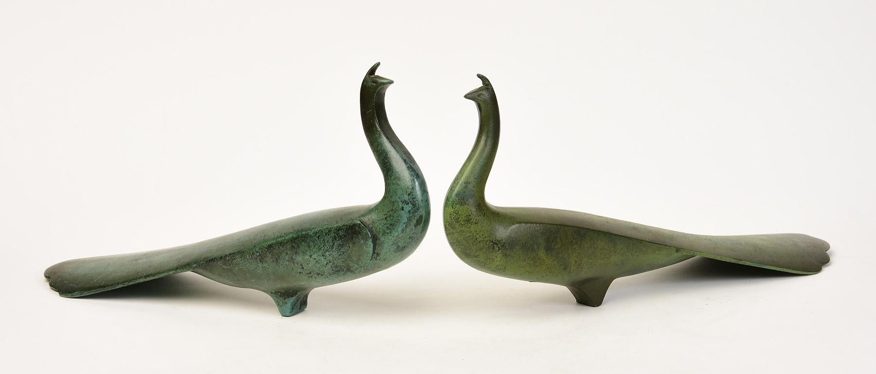 A pair of Japanese bronze animal peacock.

Age: Japan, Showa Period, 20th Century
Size: Height 16.7 - 17.5 C.M. / Width 9.9 C.M. / Length 32.8 - 33.4 C.M.
Condition: Nice condition overall.