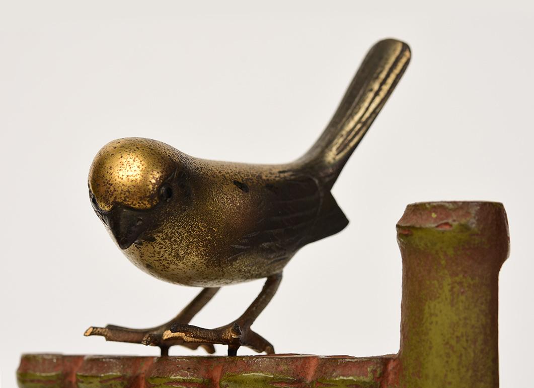 Japanese bronze bird and bamboo.

Age: Japan, Showa Period, 20th Century
Size: Height 18.8 C.M. / Width 8.8 C.M. / Length 20.5 C.M.
Condition: Nice condition overall.