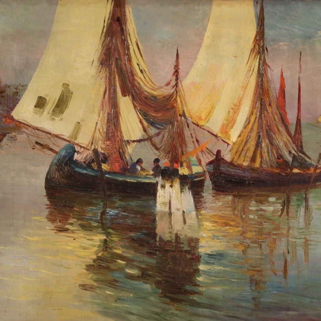 Italian painting from the first half of the 20th century. Artwork oil on canvas, on the first canvas, depicting a seascape in impressionist style, View with boats and characters of good pictorial quality. Frame in wood and plaster, carved, gilded