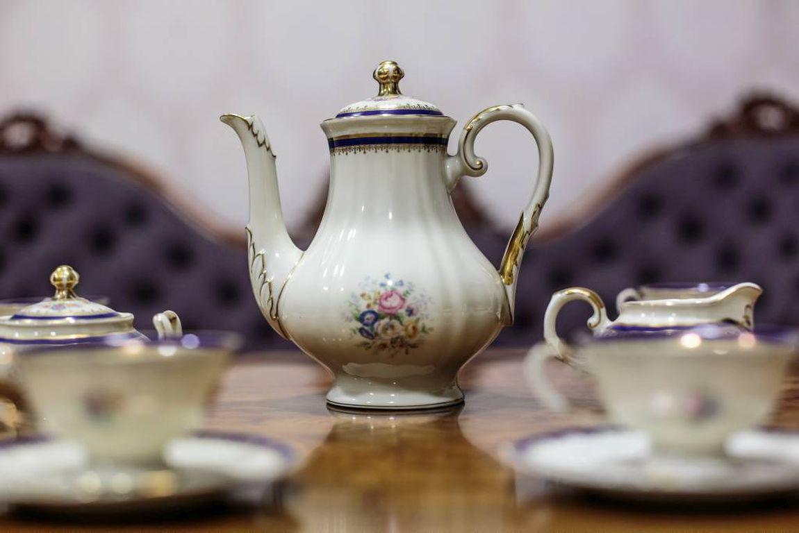 Presented coffee service was manufactured in K&A (Krautheim & Adelberg Selb Bavaria) Manufactory in Germany.
This china is in a noble shade of beige. The surface has been decorated with a subtle, floral motif, 
and a border with gildings and a
