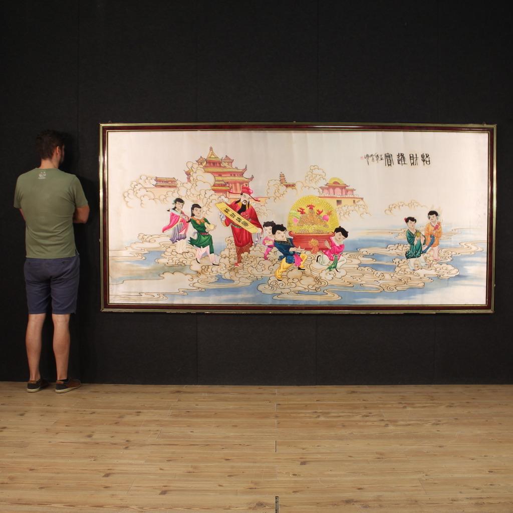Great late 20th century Chinese decorative panel. Artwork on silk and tissue, embroidered, colored and painted, depicting a landscape with figures and writings in Chinese characters. Tissue fixed and stretched on a wooden panel (see photo) with a