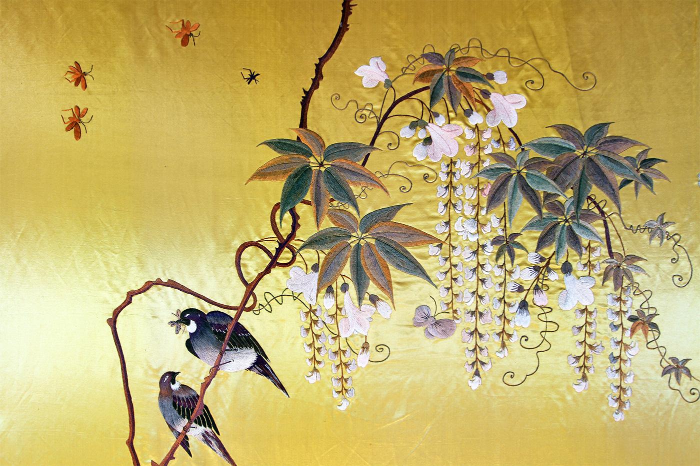 Showa period. Elegant large silk panel embroidered yellow gold with herons, wisteria and butterflies.